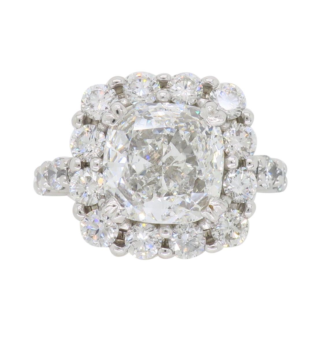 Approximately 5.31CTW GIA certified halo style diamond ring crafted in 14k white gold.

GIA Certified : 16782384 * ELECTRONIC COPY OF CERTIFICATION ONLY *
 
Center Diamond Carat Weight: 3.31CT
Center Diamond Cut: Cushion Modified Brilliant 
Center
