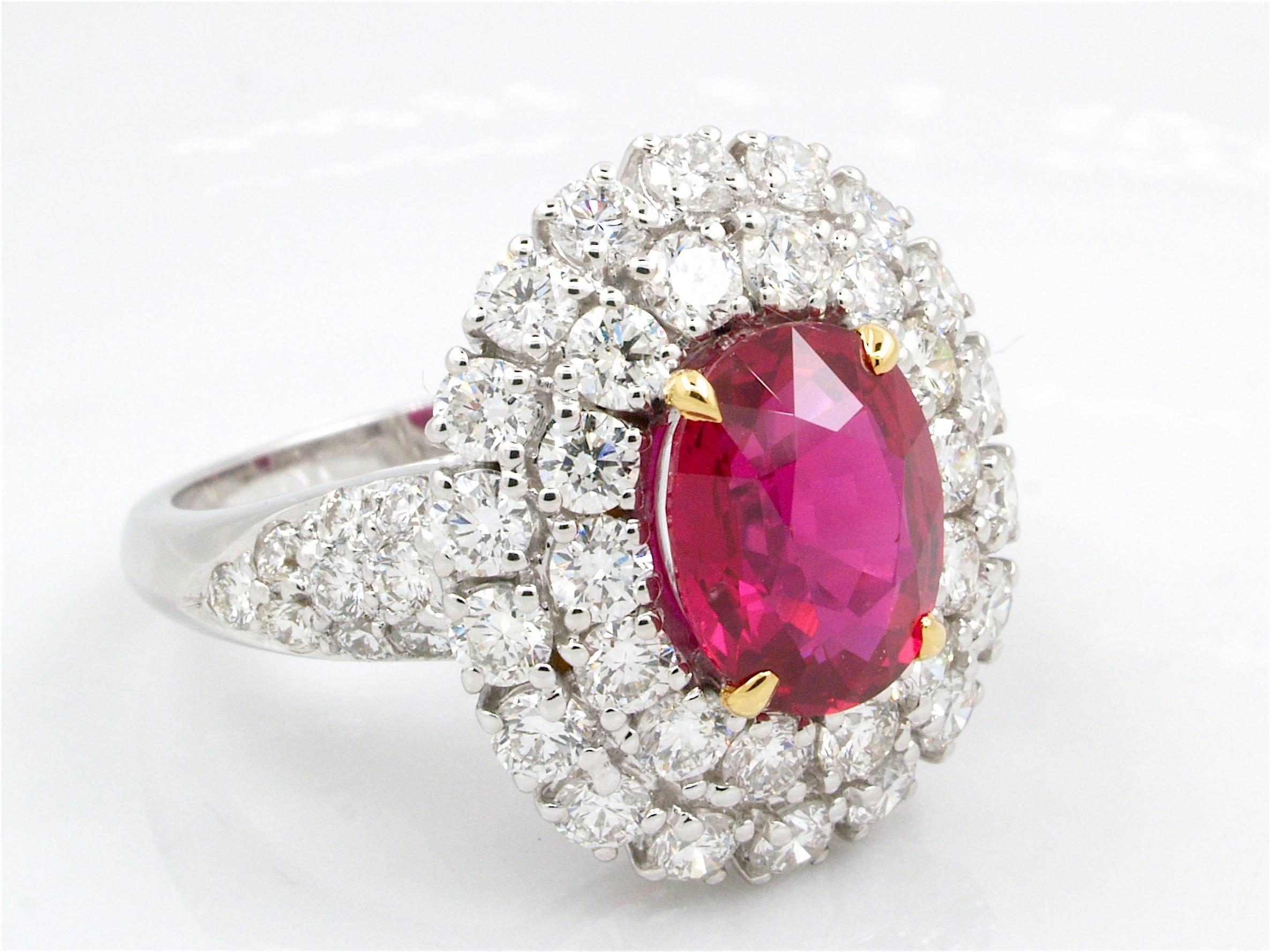 

This beautiful ring is accompanied by a magnificent natural ruby ​​with an excellent quality weighting  3.06 carats.

Diamonds surrounded the main stone and placed on the frame for a total weight of 2.25 carats, clarity VVS and color F.

The