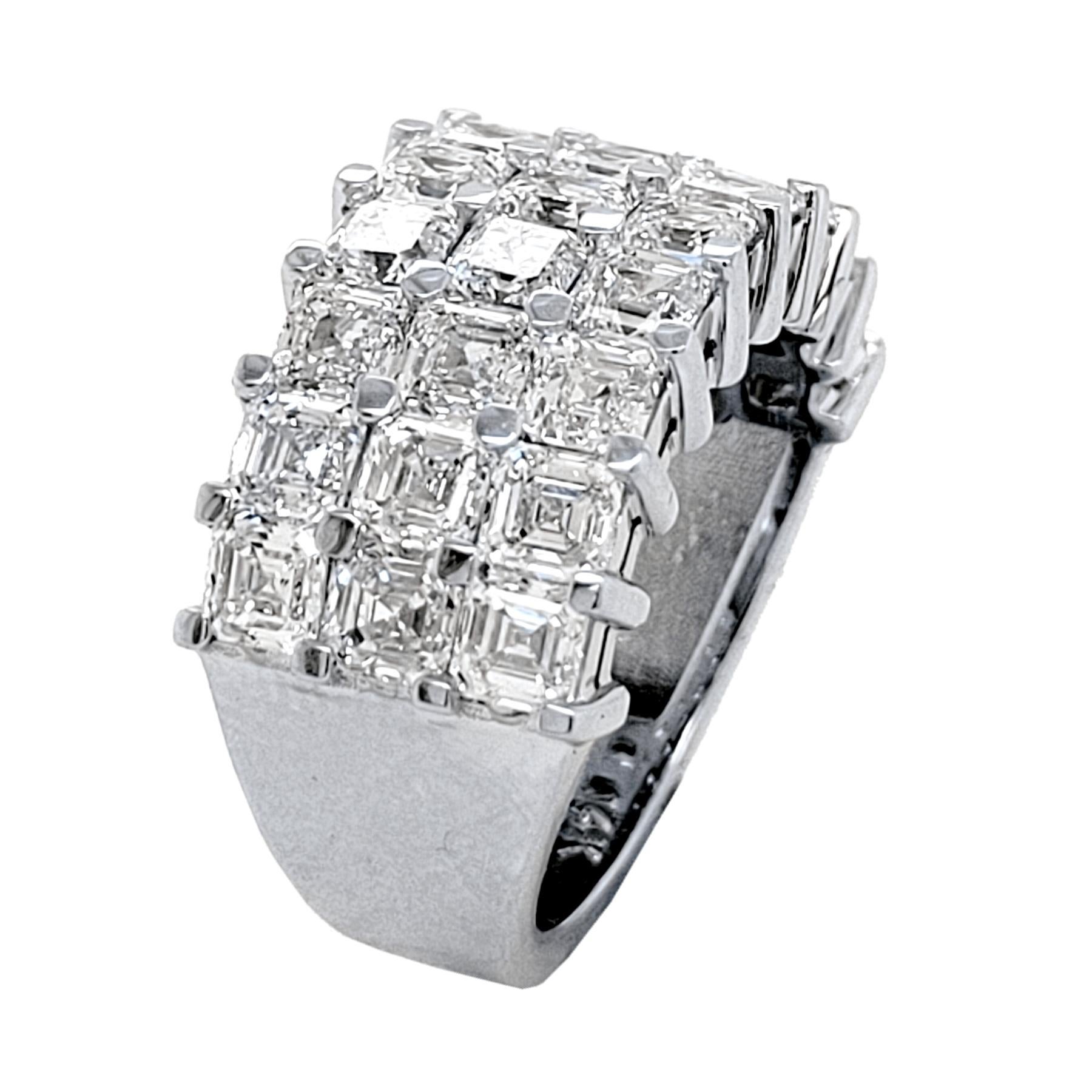 This beautiful Anniversary Ring is made of 14 Karat White gold showcasing 27 perfectly matched Asscher Cut (Square Emerald Cut) Diamonds Set in Shared Prong Mode.
The diamonds are VS Clarity E to F Color.
Total Weight of diamonds: 5.31 Ct  (9 pieces