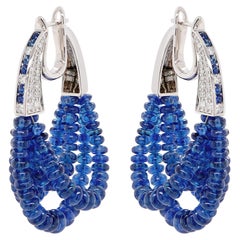 53,19 Karat Vivid Blue Sapphire & 0,75 Karat F VS Head Turner Ohrring 18K