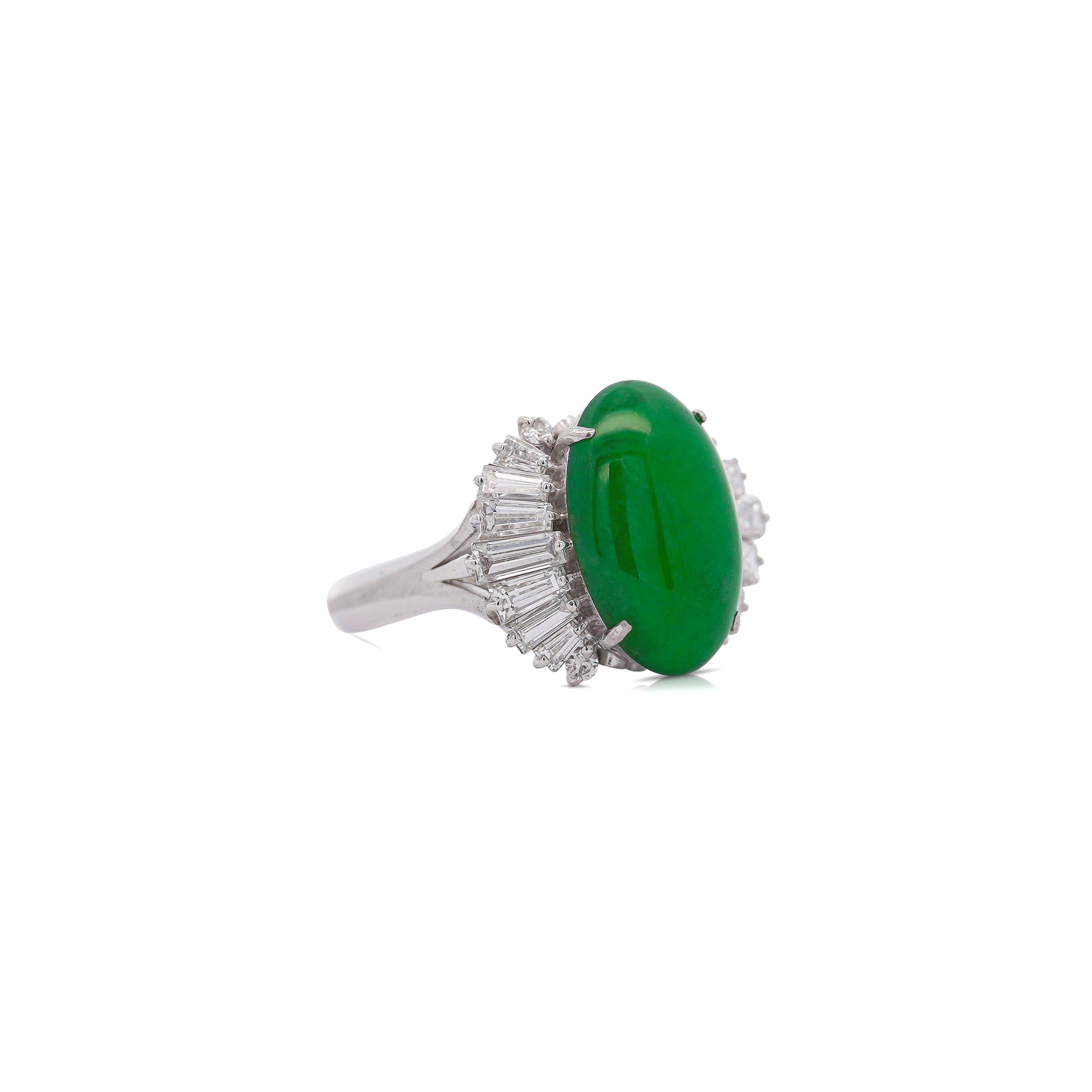 5.32 carats of true green untreated jadeite jade are displayed as the focal point of this beautiful piece. This ballerina style ring features a platinum band with delicate filigree, the lush green oval cut gemstone rests proudly at its head. 16