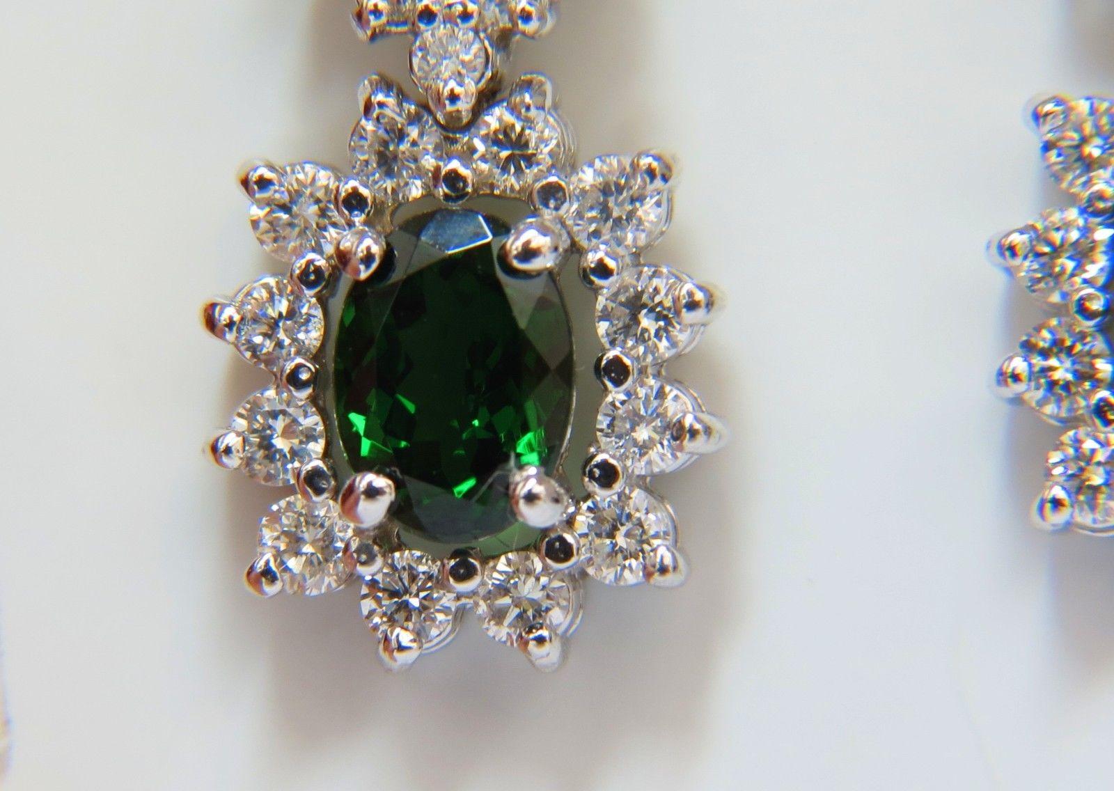 Oval Cut 5.32 Carat Natural Vivid Green Tsavorite Diamond Earrings 14 Karat Halo Dangle For Sale