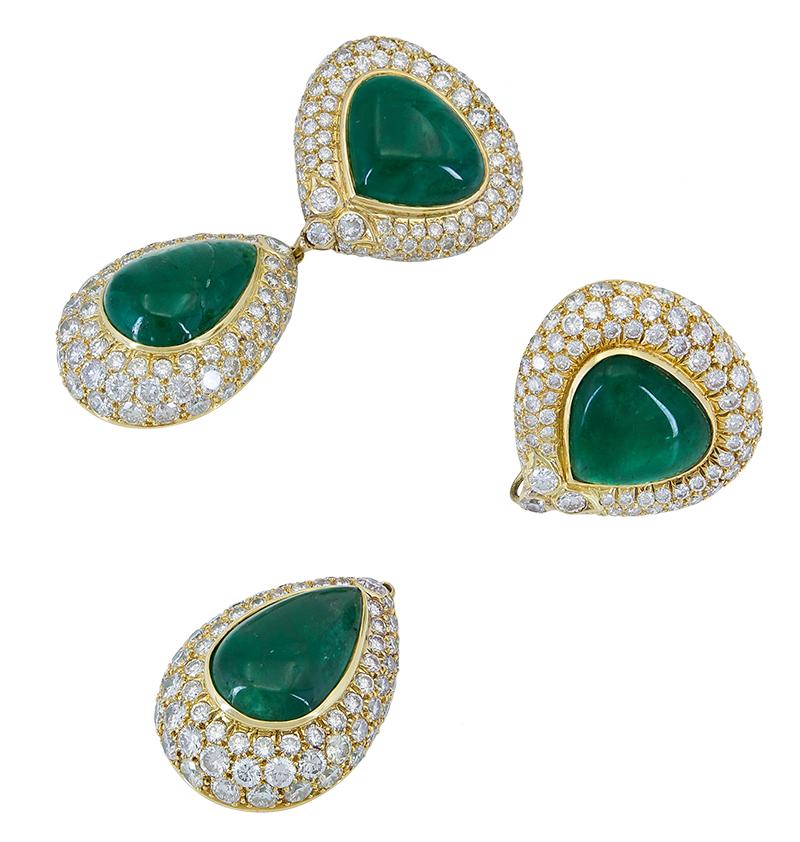 An important piece showcasing a detachable drop design. It can be worn as dangle earrings or clip on earrings. Each earring features two pear shape diamonds surrounded by micro-pave diamonds set in 18k yellow gold. Clip-on without post. 
Green