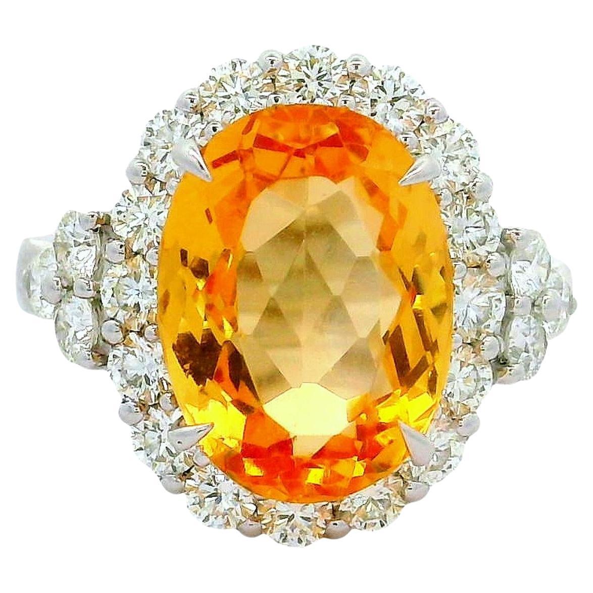 Anello di platino con diamante aureolato di 5,33 carati con topazio imperiale