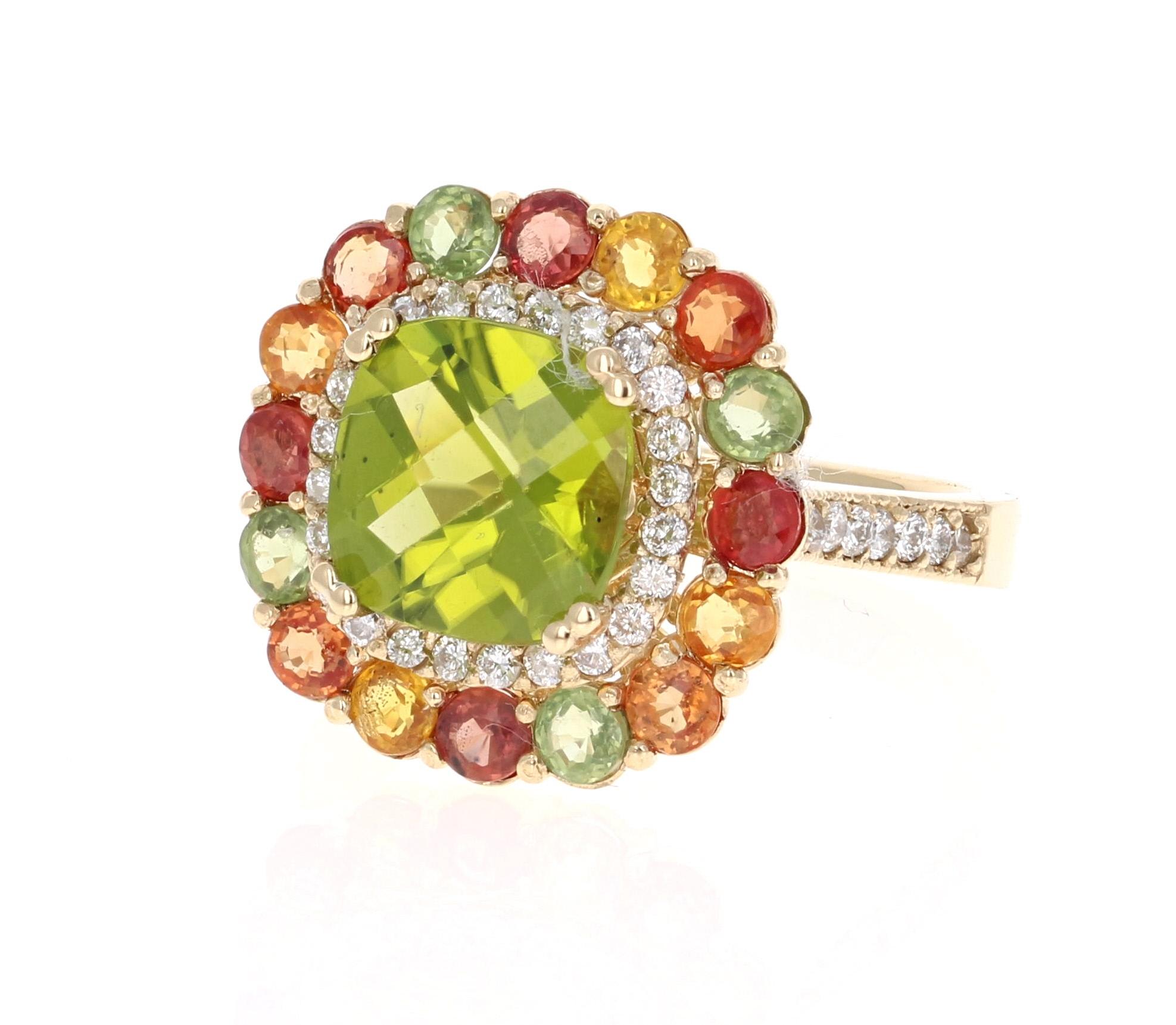 Uniquely Designed into a Masterpiece! 

This beautiful ring has a Cushion Cut Peridot that weighs 2.85 Carats. The ring is surrounded by 38 Round Cut Diamonds that weigh 0.45 Carats (Clarity: SI, Color: F) and also 16 Multi Colored Sapphires that