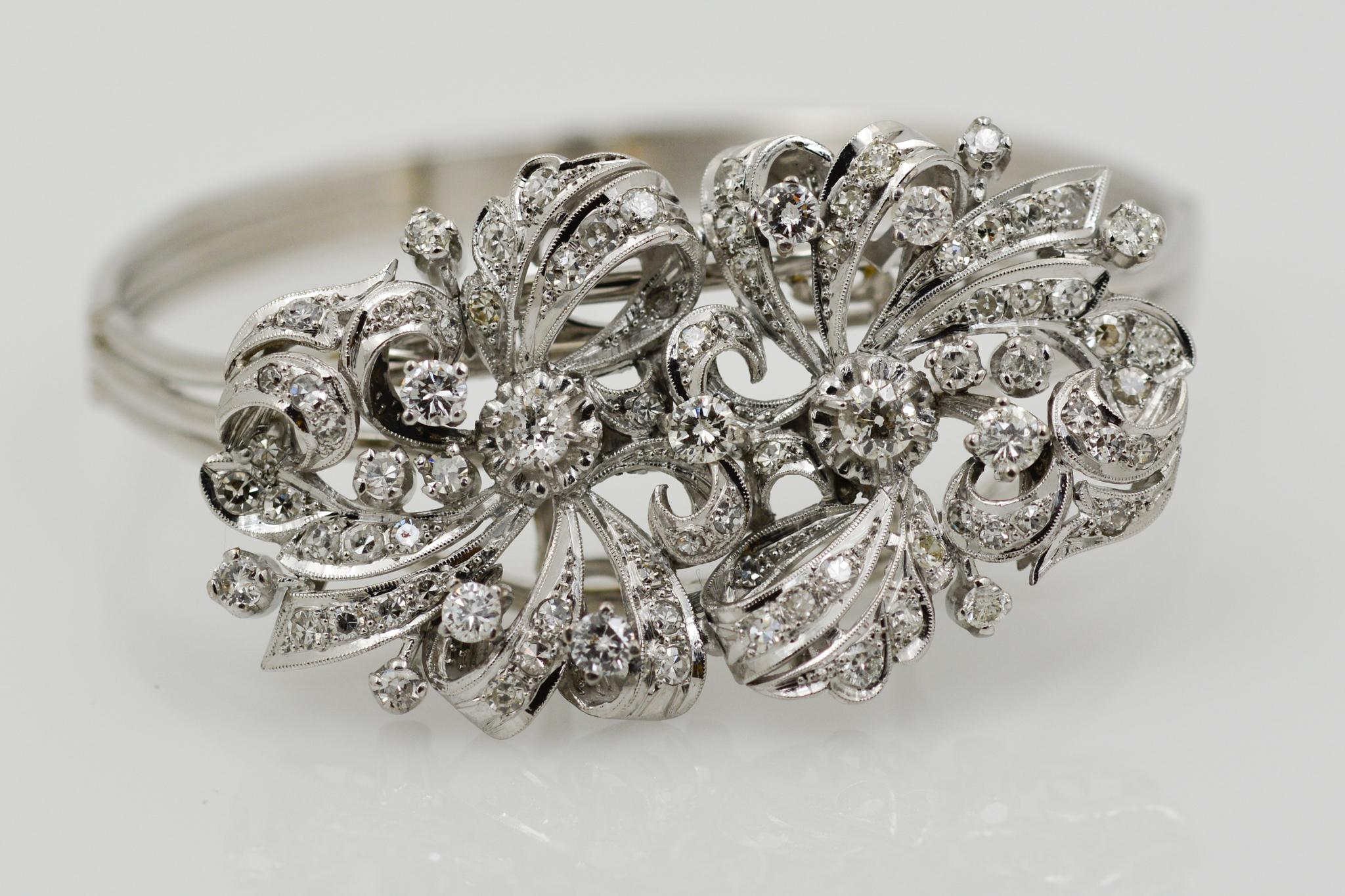 Exclusively from the Eiseman Estate Jewelry Collection, this 14k white gold and platinum bracelet and pin combination features 72 single cut and 17 round brilliant cut diamonds (5.34ctw H-I SI-I). The pin can be worn attached to the 14k white gold