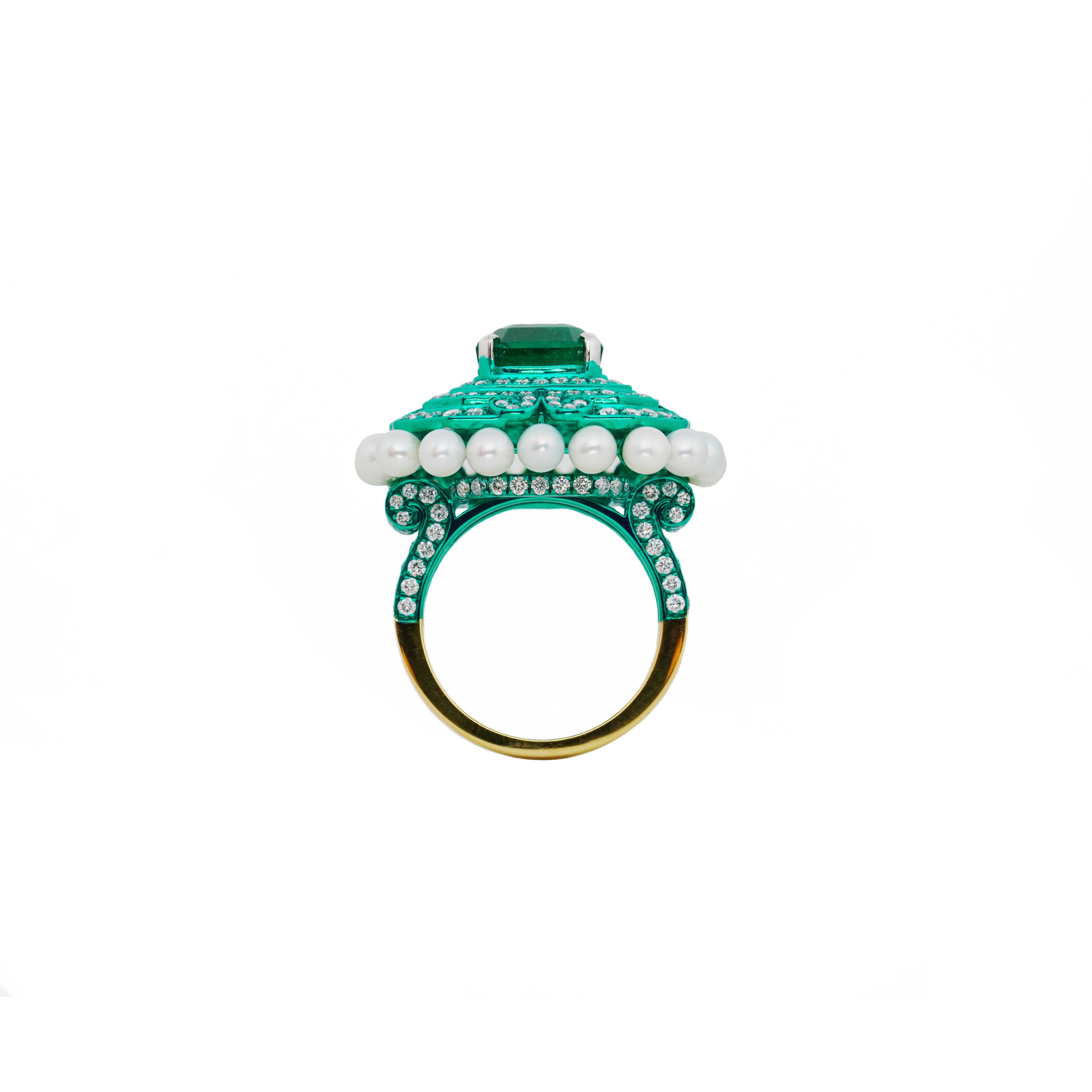 The Maze Garden Ring from 'The Garden of Myth Collection' by Austy Lee is a stunning piece of jewelry. It showcases a 5.34-carat Zambian Vivid Green Emerald as the center stone, which adds a vibrant touch to the ring. 

The emerald is surrounded by