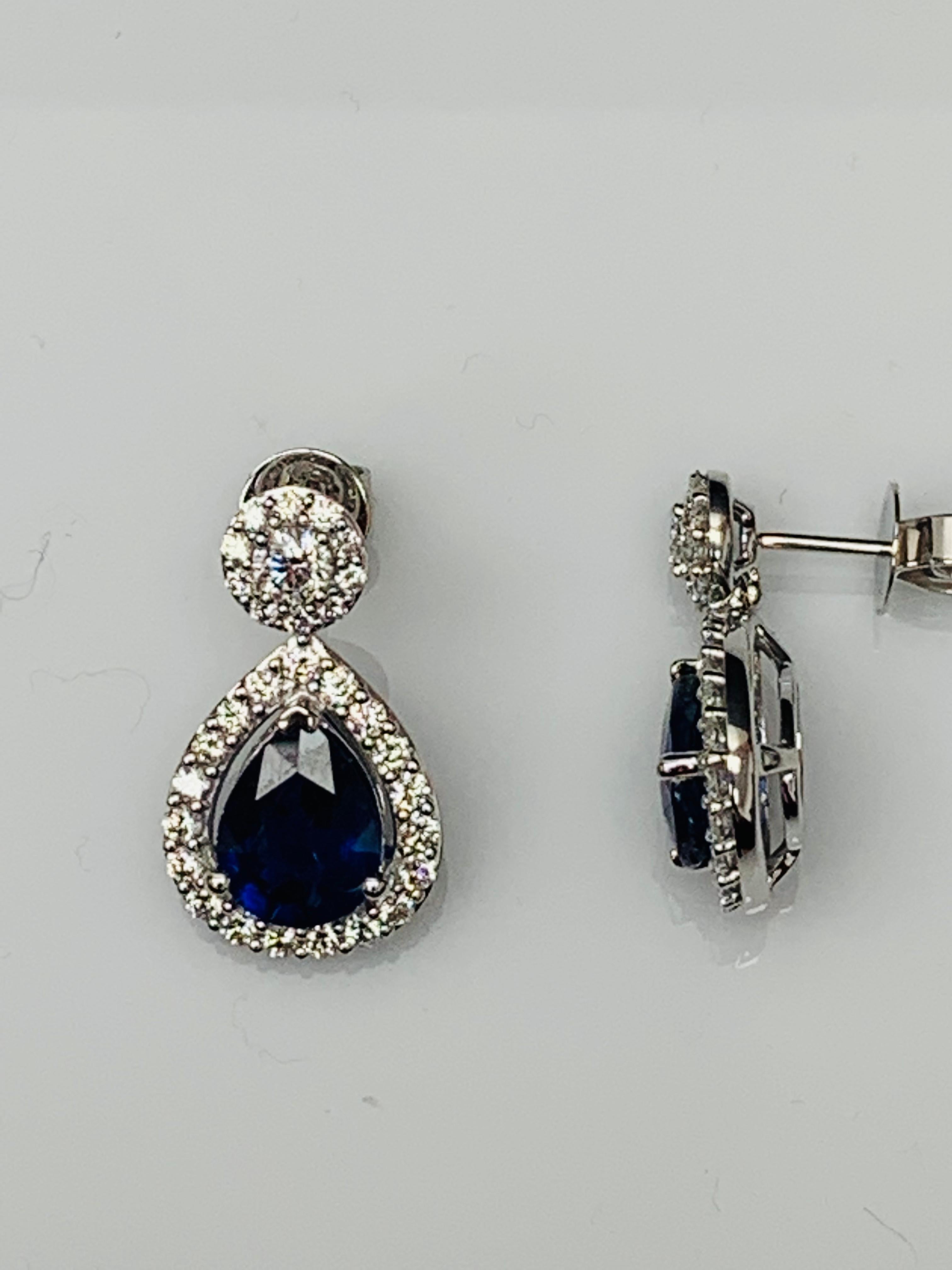 Contemporary 5.34 Carat of Pear Shape Blue Sapphire Diamond Drop Earrings in 18K White Gold For Sale