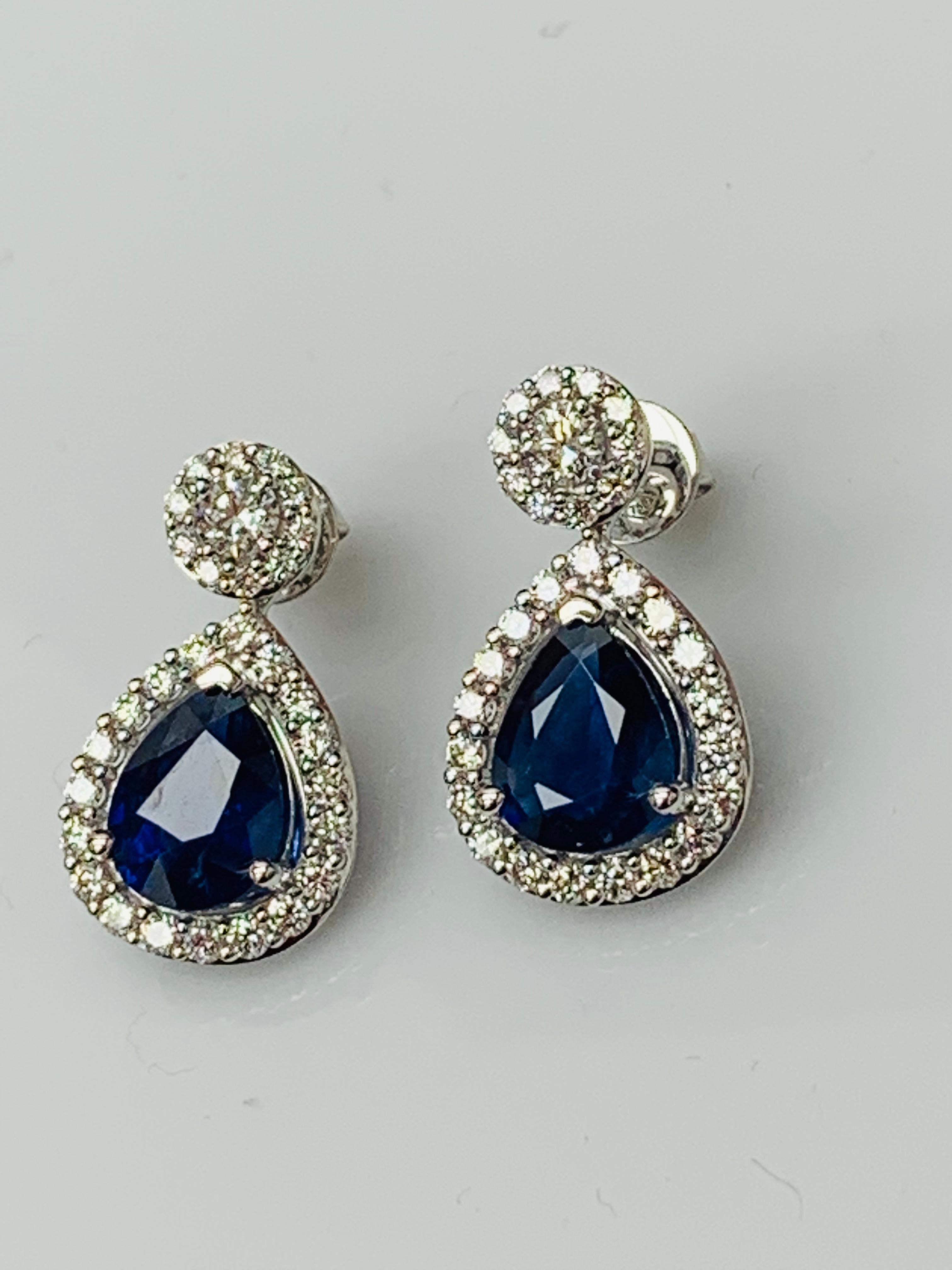 Pear Cut 5.34 Carat of Pear Shape Blue Sapphire Diamond Drop Earrings in 18K White Gold For Sale