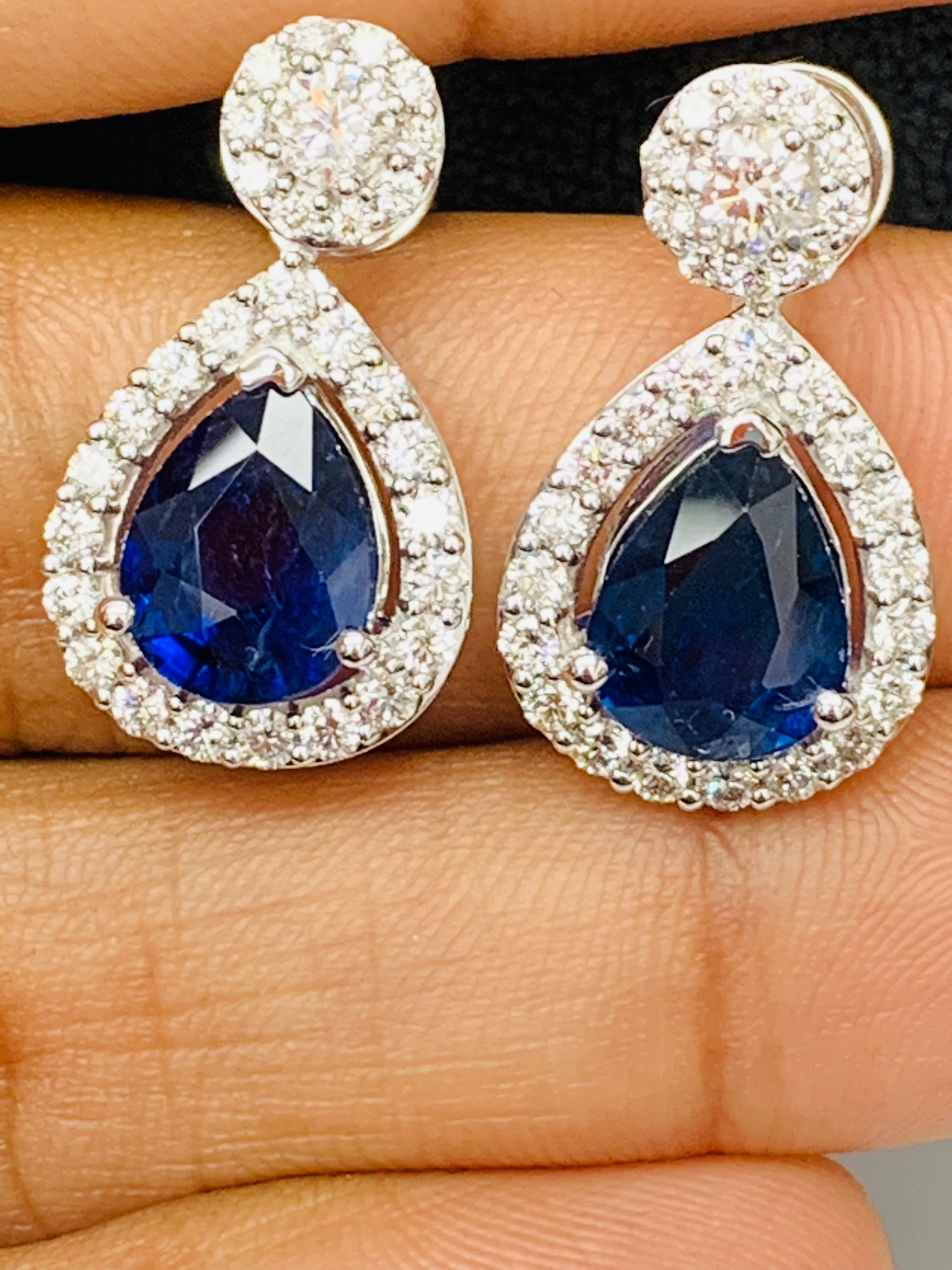 Women's 5.34 Carat of Pear Shape Blue Sapphire Diamond Drop Earrings in 18K White Gold For Sale