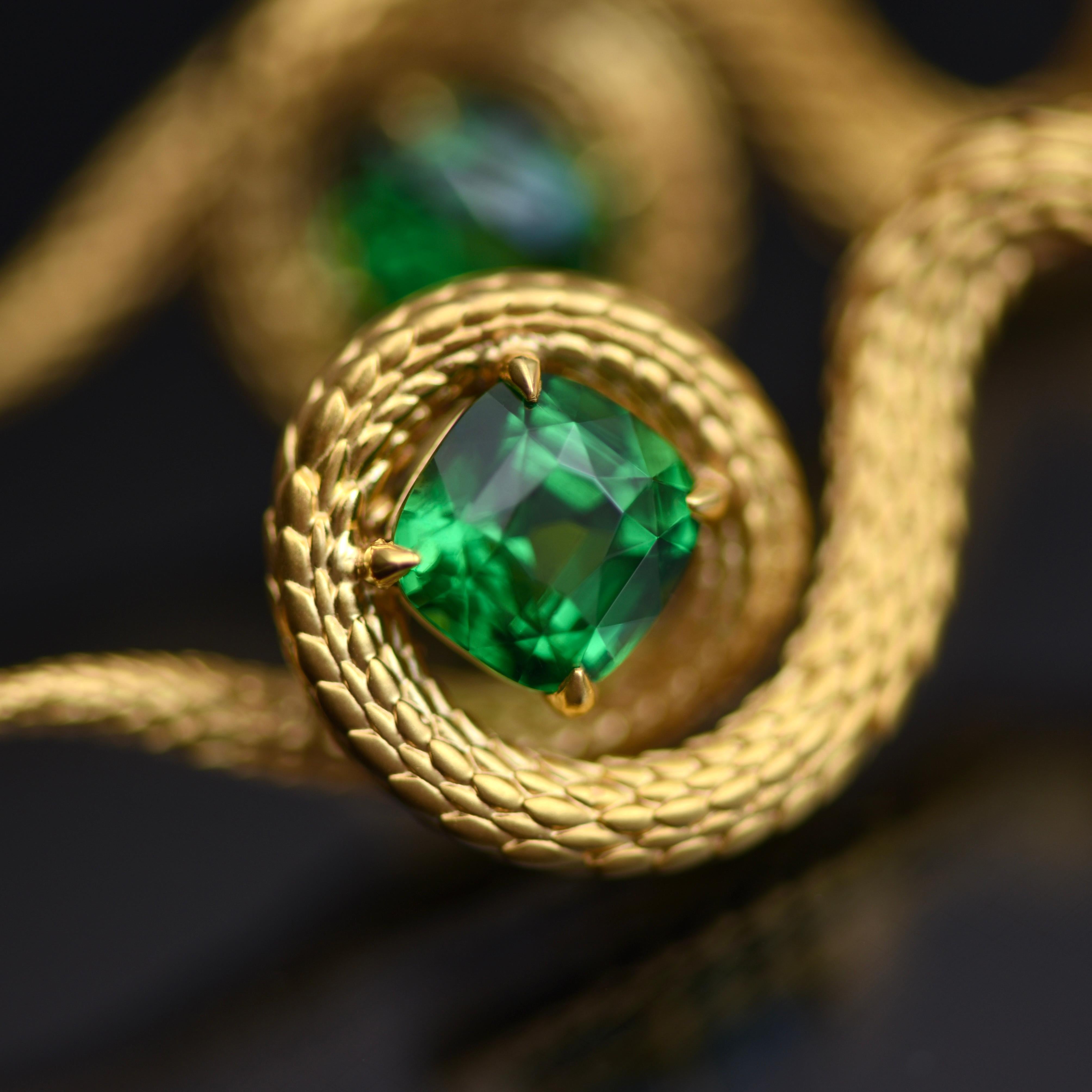 Egyptian Revival 5, 34 Carat Vivid Green Tsavorite 18 Karat Yellow Golden Serpent Earrings by D&A
