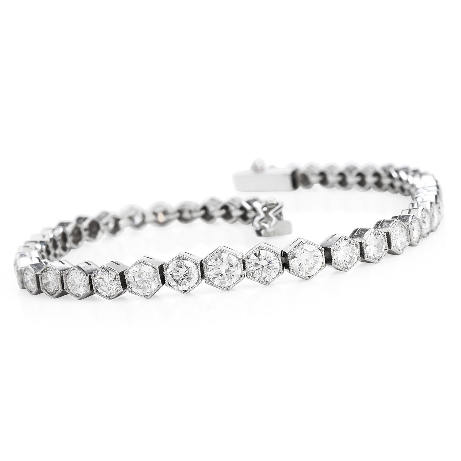 Crafted in solid Platinum, the incredible sparkle on this Diamond bracelet comes from its 49 Genuine Round cut Diamonds with a total carat weight of 5.34cts, G-H color, VS1-VS2 clarity, all prong set. The Modern touch on this piece comes from the