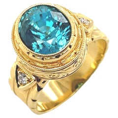5.34 ct. Blue Zircon, Diamond Yellow Gold Bezel Hand Engraved Signet Band Ring