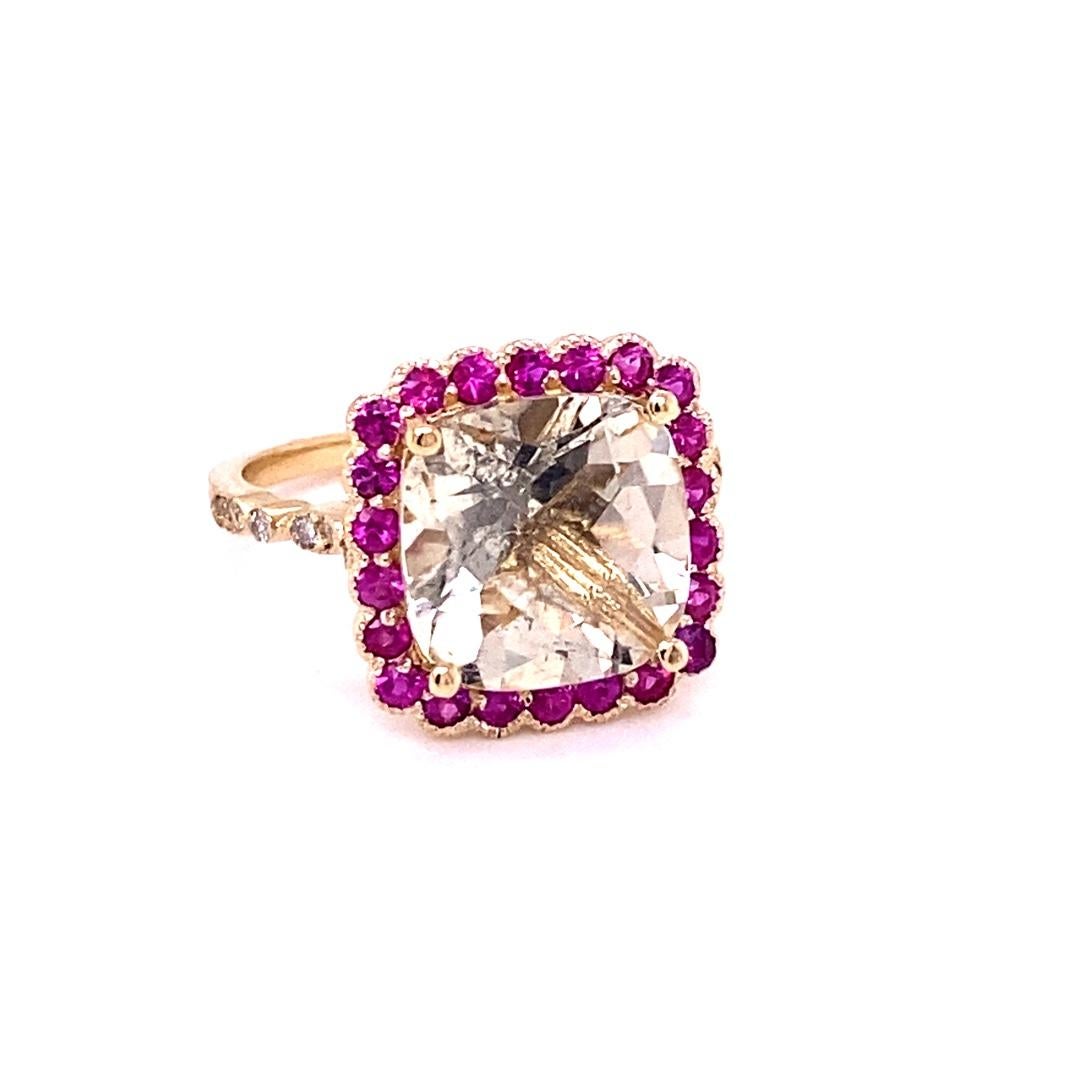 5.35 Carat Citrine Sapphire Diamond Yellow Gold Engagement Ring

This gorgeous ring has a beautiful Cushion Cut Champagne Citrine Quartz weighing 4.52 Carats and is surrounded by 22 Pink Sapphires weighing 0.72 Carats and 12 Round Cut Diamonds