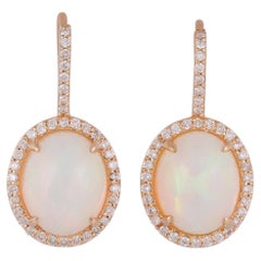 Boucle d'oreille opale et diamants de 5,35 carats 