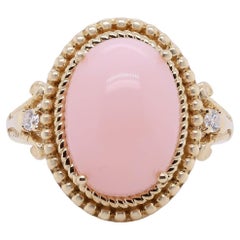 5.35 Carat Oval-Cab Pink Opal with Diamond Accents 14K Yellow Gold Ring 5.35 Carat Oval-Cab Pink Opal with Diamond Accents 14K Yellow Gold Ring