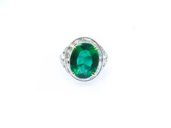 18 Karat White Gold 5.35 Carat Oval Cut Emerald White Diamond CocktailRing