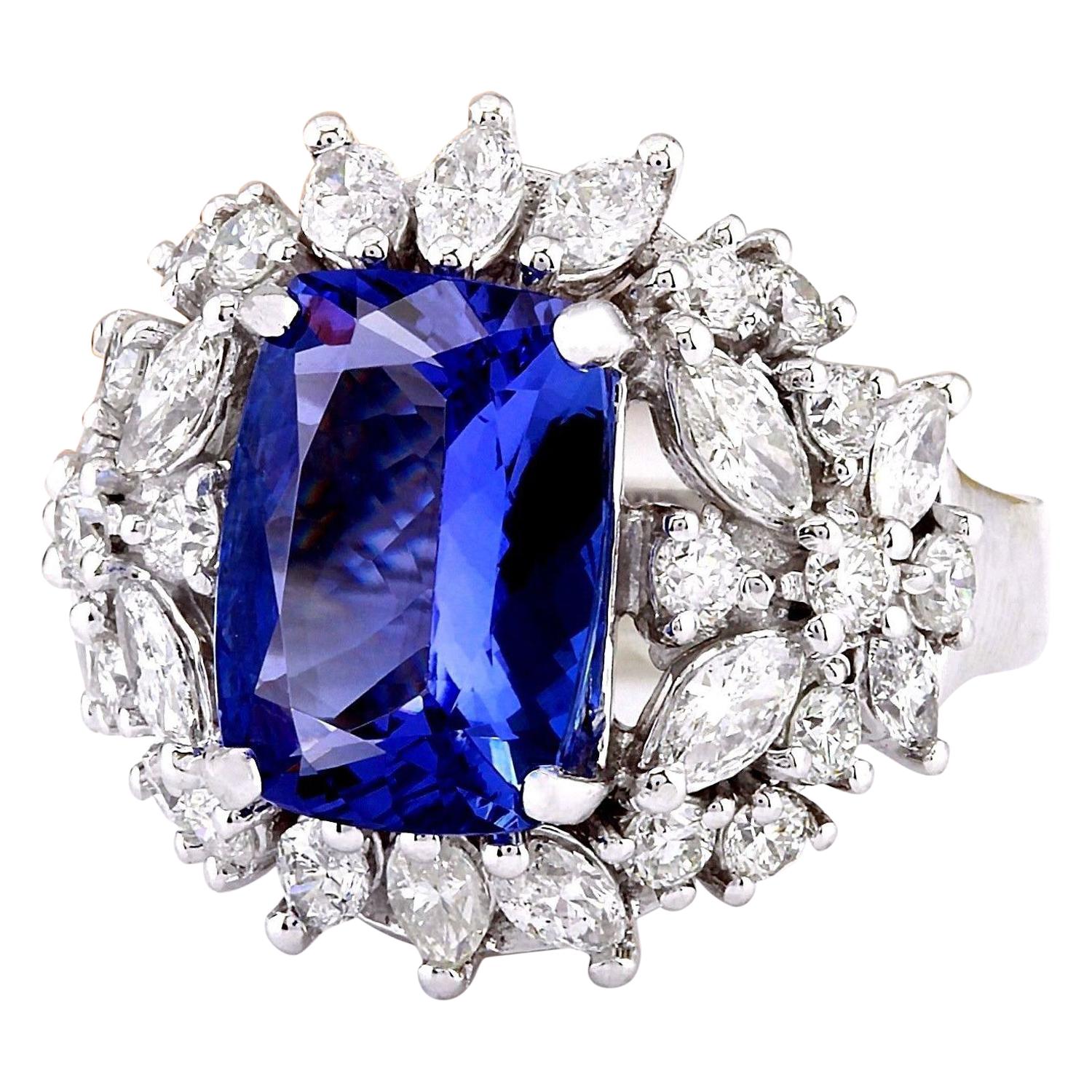 Introducing our captivating 5.35 Carat Tanzanite 14K Solid White Gold Diamond Ring. Crafted from luxurious 14K White Gold, this ring boasts a total metal weight of 6.7 grams, ensuring quality and durability. The centerpiece is a mesmerizing