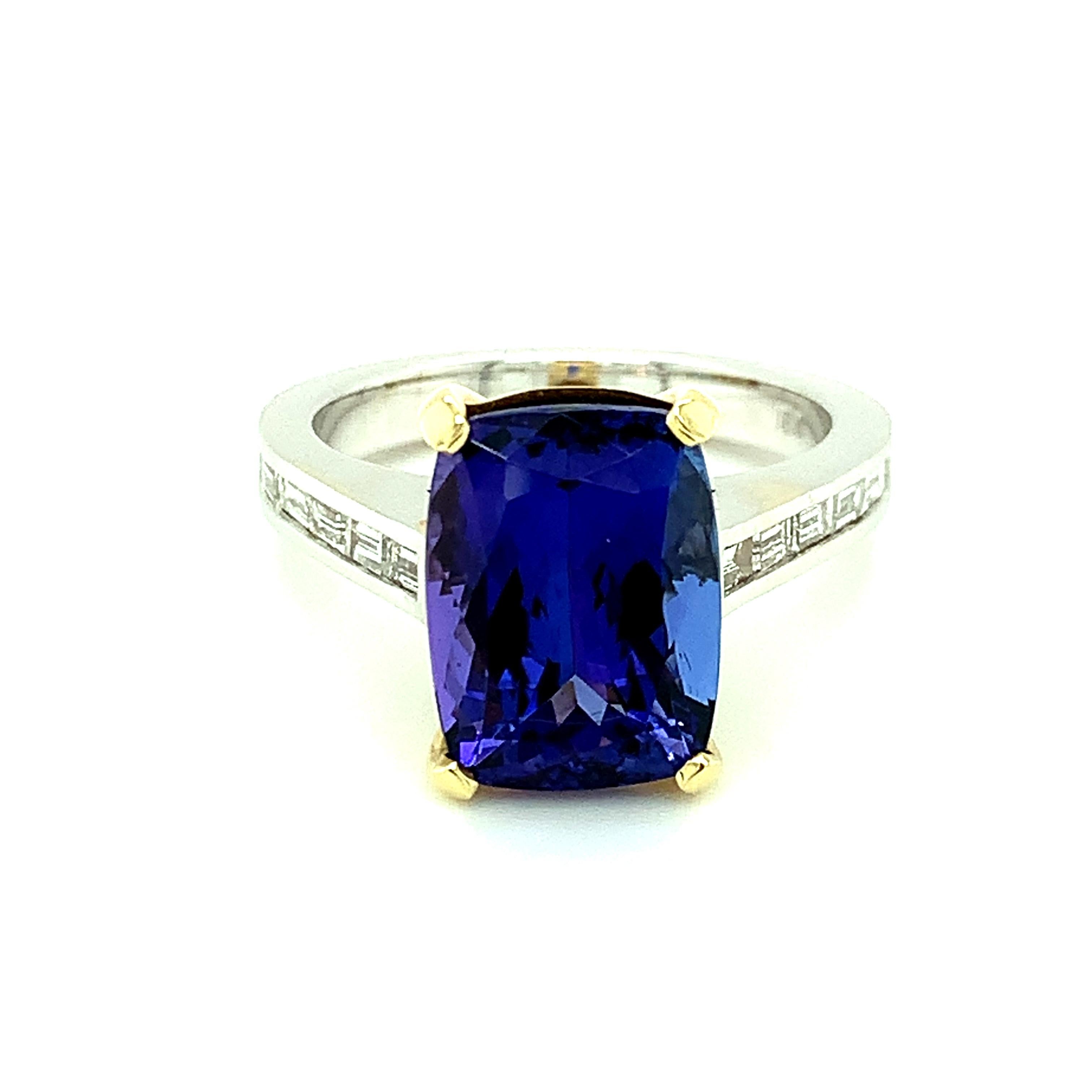This handsome, contemporary, fine gemstone ring features a 5.35 carat richly colored, bluish violet tanzanite  weighing 5.35 carats! The tanzanite is a slightly elongated cushion shape, giving it a very elegant appearance. This design, part of our