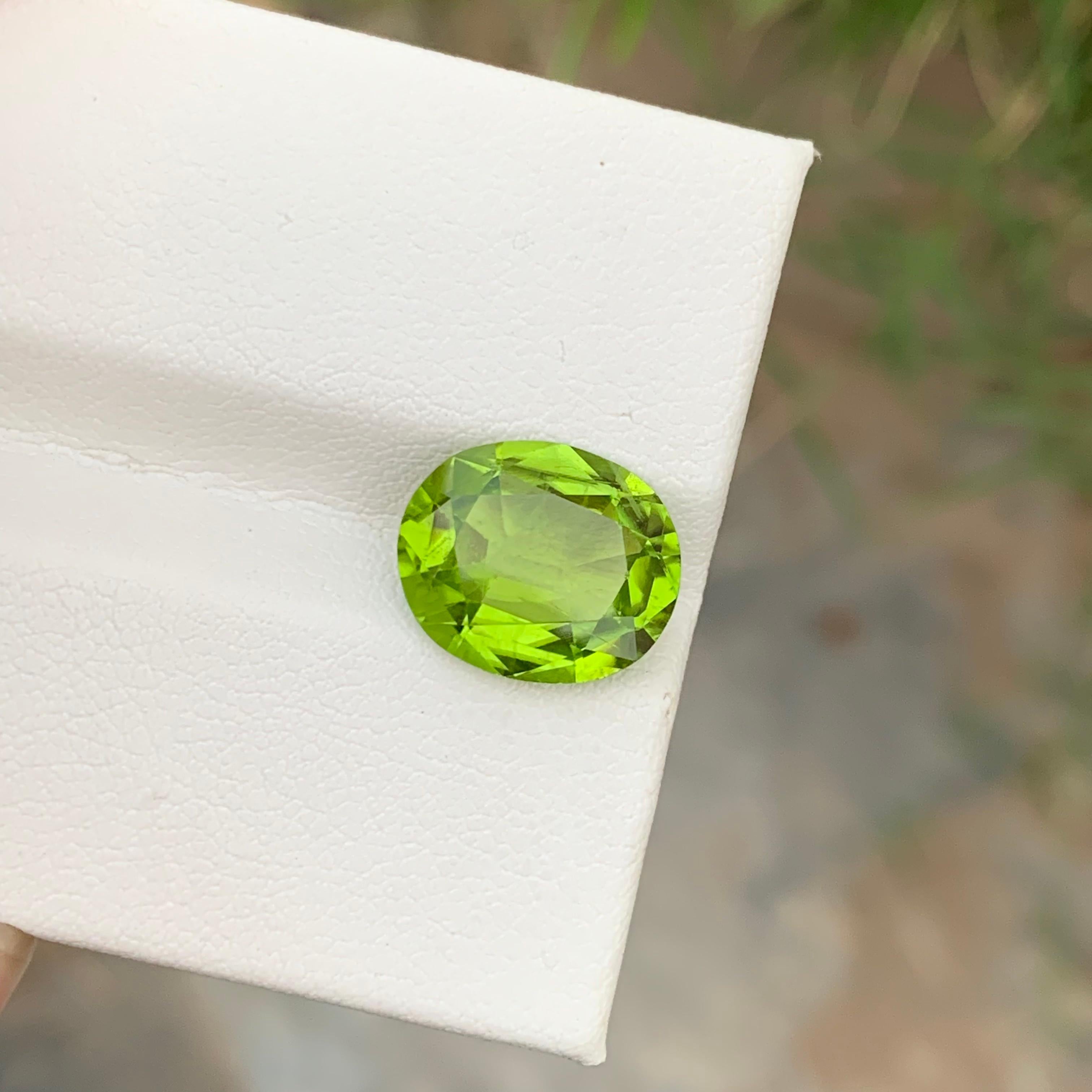 Oval Cut 5.35 Carats Natural Apple Green Loose Peridot Gem From Suppart Valley Mine For Sale