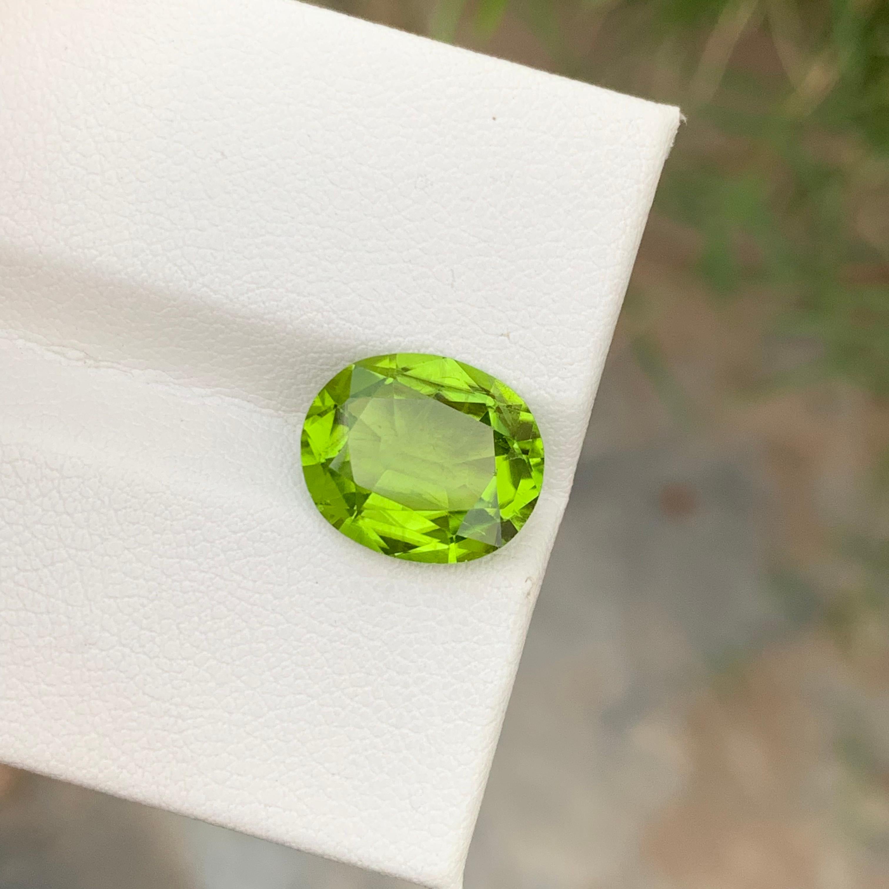 Women's or Men's 5.35 Carats Natural Apple Green Loose Peridot Gem From Suppart Valley Mine For Sale