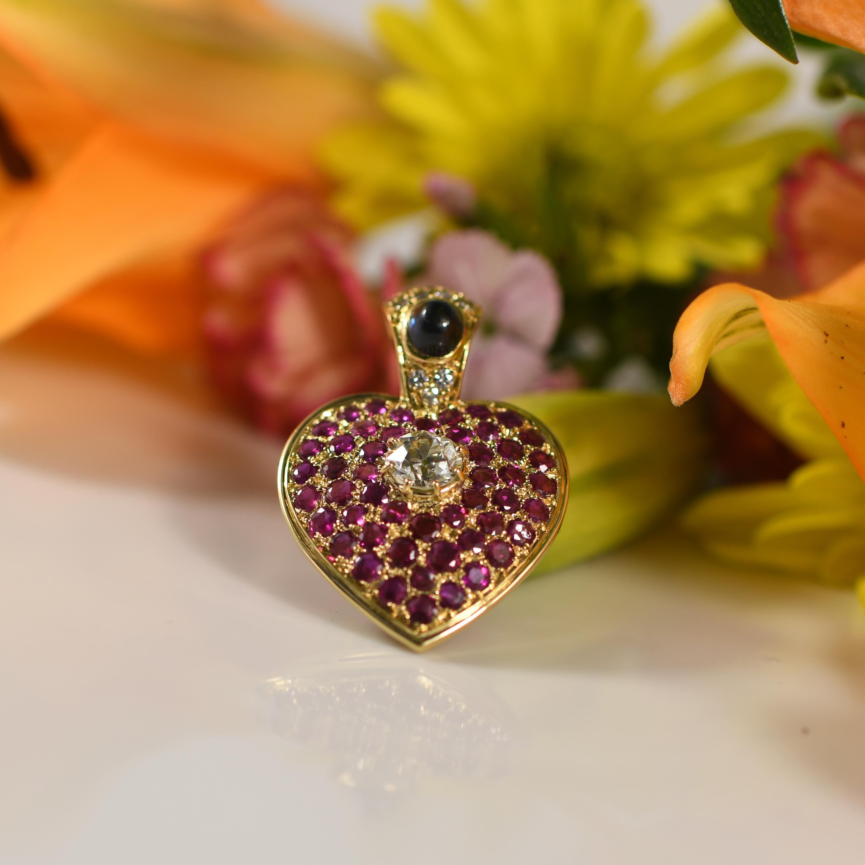 Embrace romance and sophistication with this exquisite heart-shaped pendant, crafted in luxurious 18K yellow gold. At its center, a radiant 1.30 carat old European cut diamond steals the show, capturing the essence of enduring love and timeless