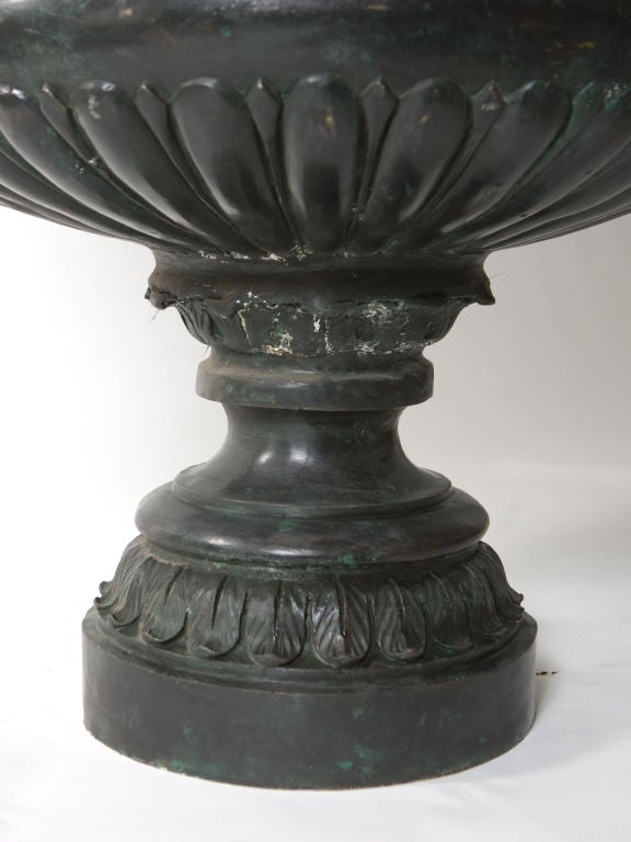 Impressive bronze garden urn with heavily carved decoration and deep patina. Measures: 53.5