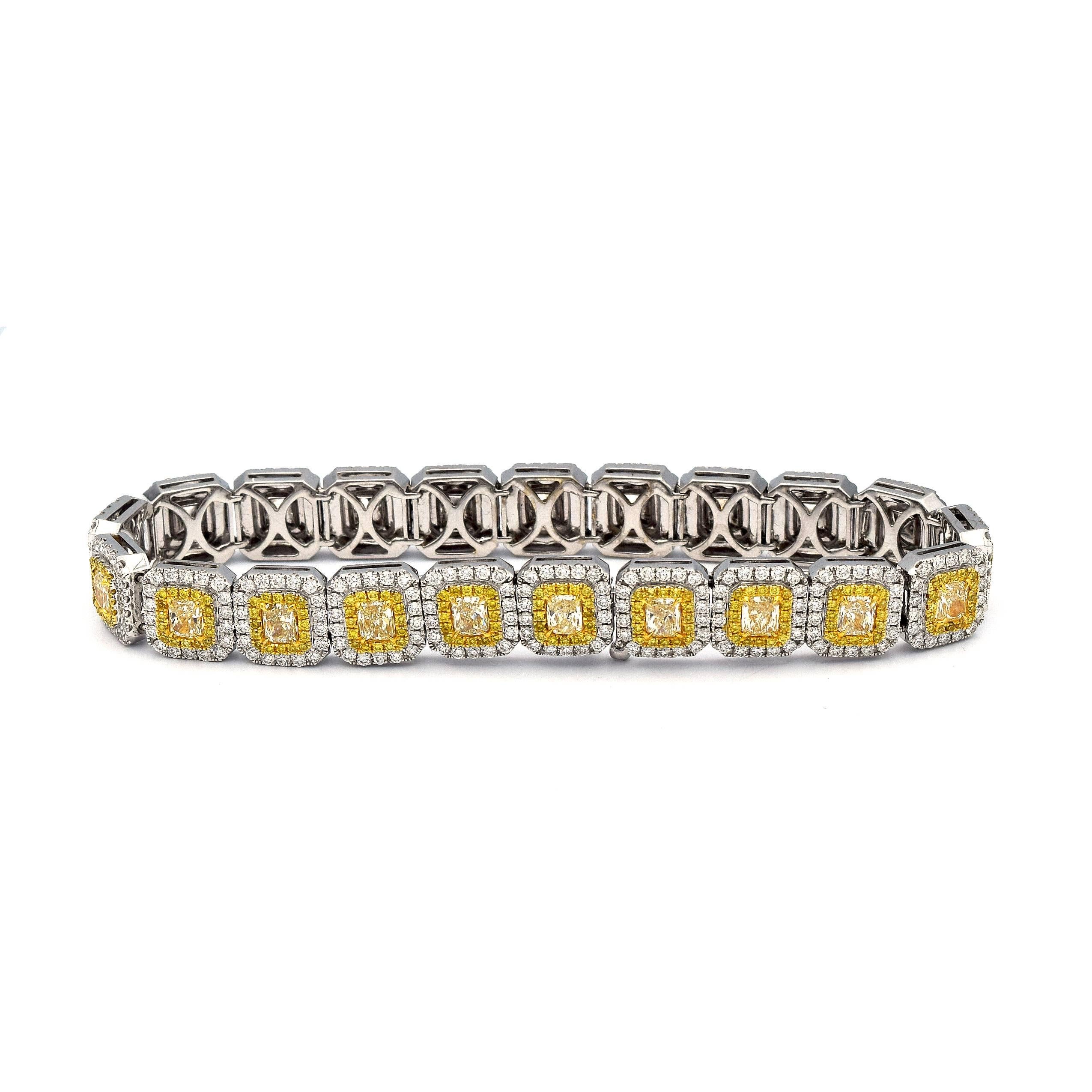 This stunning Tennis Bracelet consisting of 21 Radiant Fancy Yellow Diamonds, with Pave White and Yellow Diamonds, give this bracelet a total caret weight of 5.36ct. 

Mounted in 18K White Gold, giving this bracelet a weight of 33.22 grams.