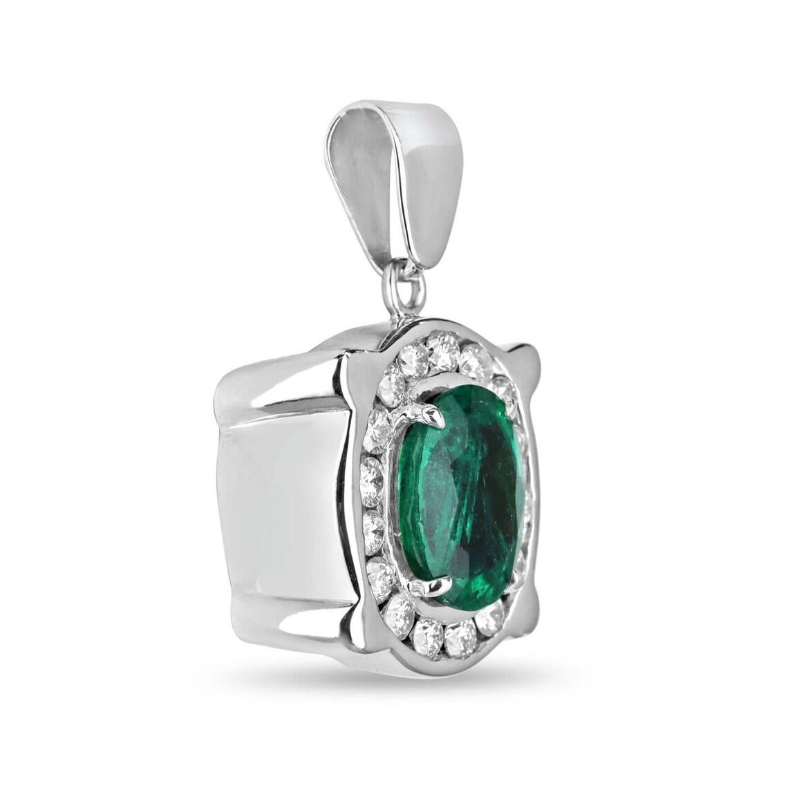 Introducing our striking Men's Emerald and Diamond Halo Pendant, designed to make a bold statement. The focal point is a remarkable 4.24-carat oval cut emerald of fine quality, boasting a lush rich green color, semi-transparent clarity, and