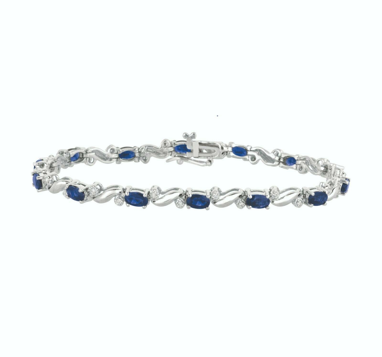 100% Natural Diamonds and Sapphires 
5.37CTW (Diamonds - 0.18CT, Sapphires - 5.19CT)
Dia Color: G-H 
Dia Clarity: SI  
14K White Gold, prong style
7 inches in length

B4153WS
ALL OUR ITEMS ARE AVAILABLE TO BE ORDERED IN 14K WHITE, ROSE OR YELLOW
