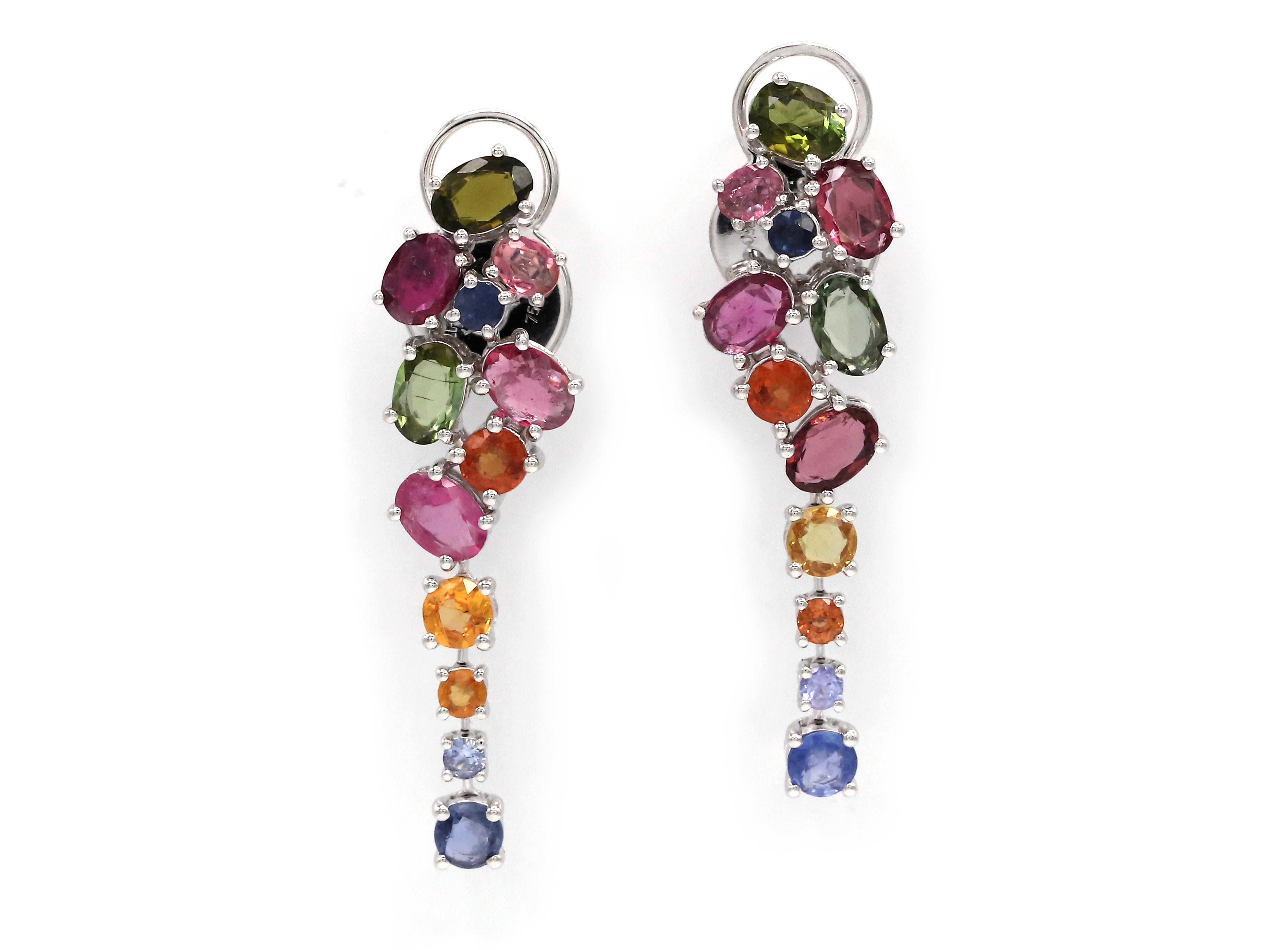 18 K White Gold

23 Gems (total weight: 5.37 Carat): Yellow Sapphire, Rubis, Emerald, Topaz and Amethyst

ALPENGEM uses gems of exceptional quality to create exquisite high end jewelry. These earrings are inspired by Art Deco floral motives. The