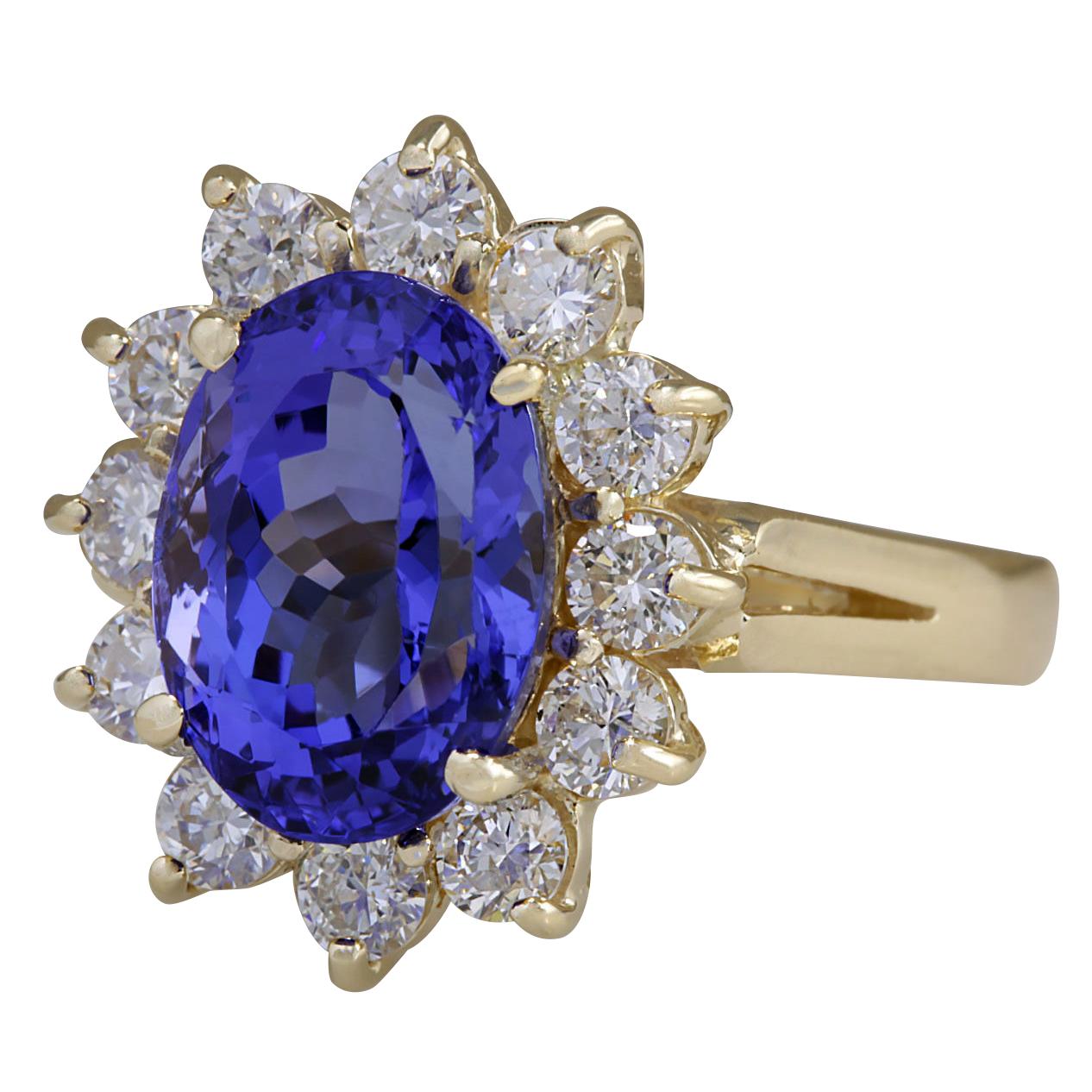 5.37 Carat Natural Tanzanite 14 Karat Yellow Gold Diamond Ring
Stamped: 14K Yellow Gold
Total Ring Weight: 4.5 Grams
Total Natural Tanzanite Weight is 4.42 Carat (Measures: 11.00x9.00 mm)
Color: Blue
Total Natural Diamond Weight is 0.95 Carat
Color: