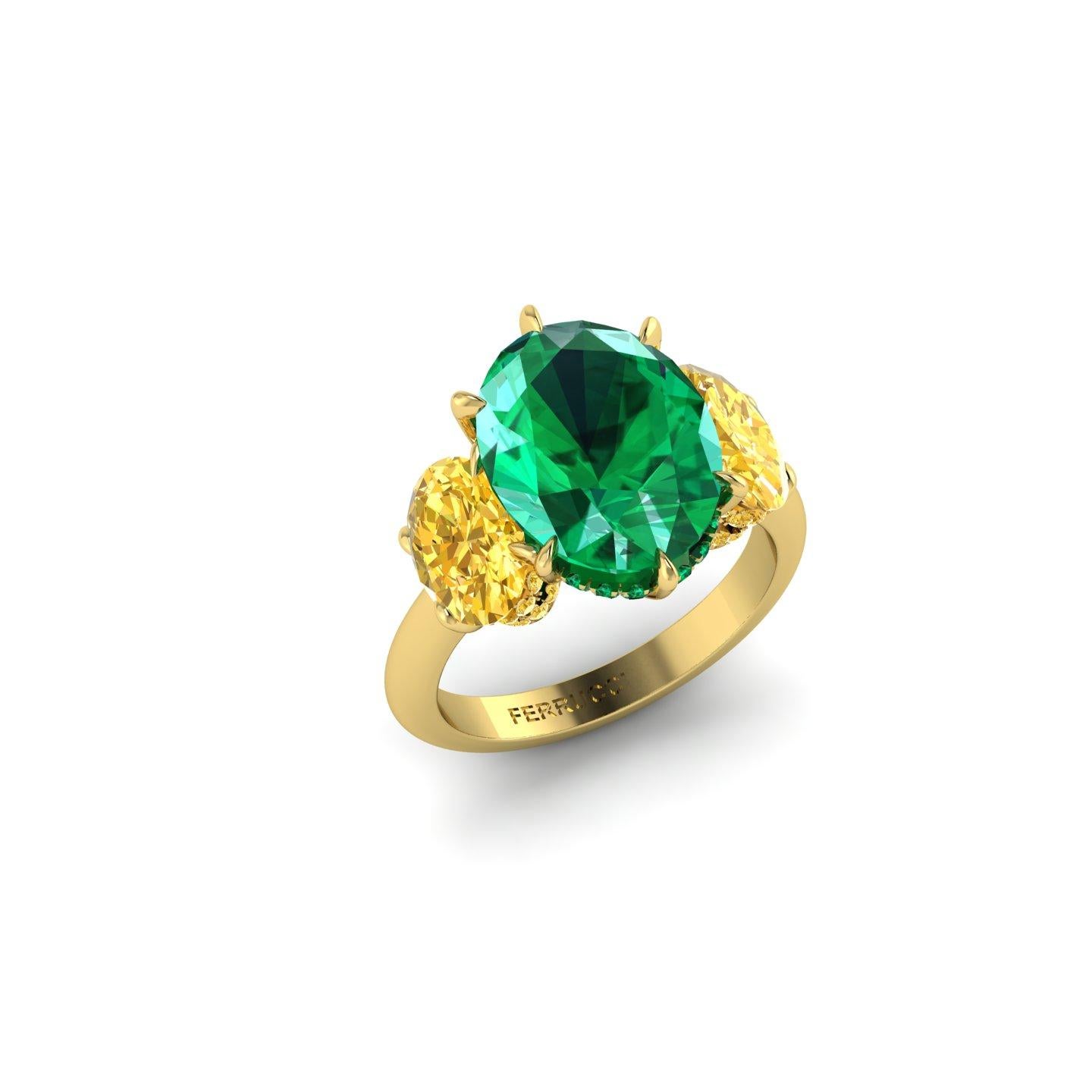 Eye Clean 5.37 carat Oval Emerald, rare beauty, sided by two 1 carat each Vivid Yellow Intense Oval diamonds, GIA Certified, clarity ranging between VVS and VS, rich yellow color, no fluorescence, made in 18k yellow gold, embellished by Pave' set