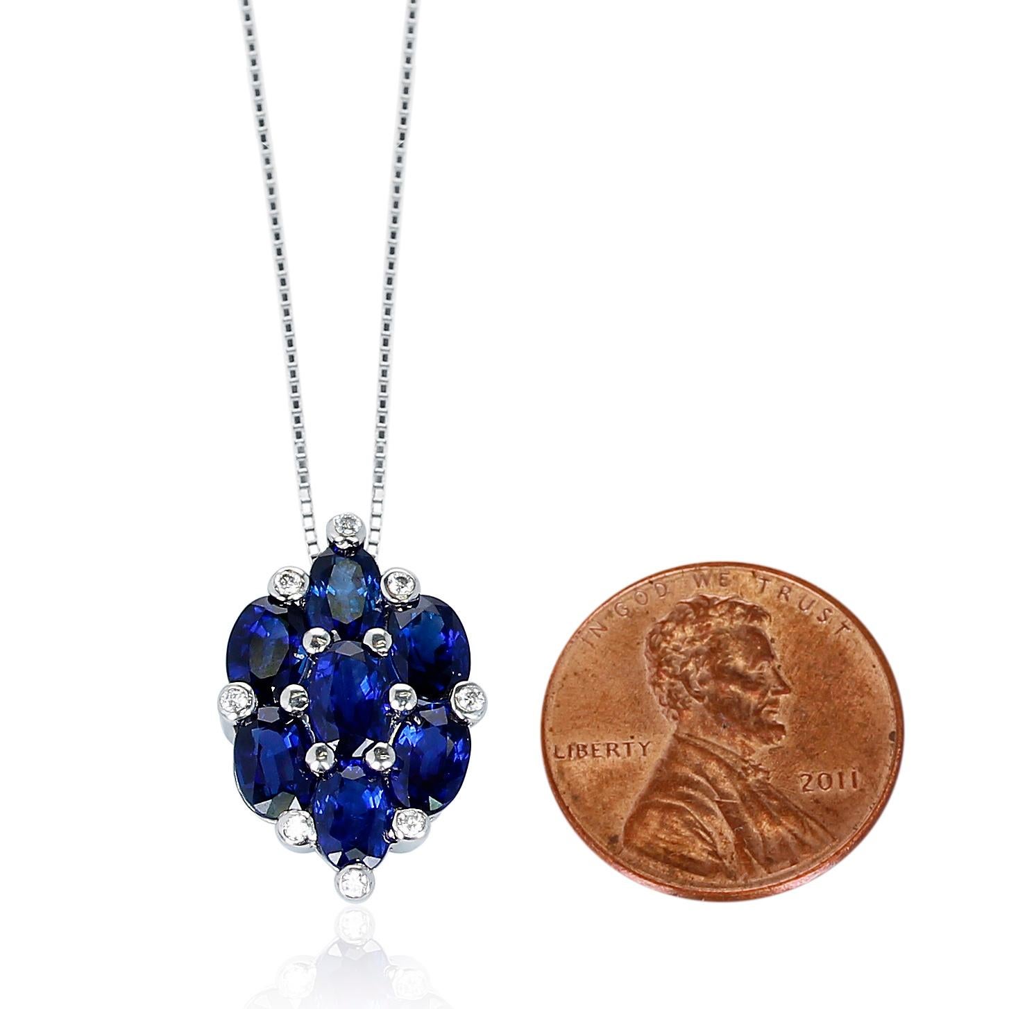 A 5.37 ct. Seven Oval-Shape Blue Sapphire and 0.08 ct. Diamonds Pendant Necklace made in Platinum. The total weight is 5.71 grams.  
