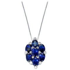 Vintage 5.37 Ct. Seven Oval-Shape Blue Sapphire and 0.08 Ct. Diamonds Pendant Necklace