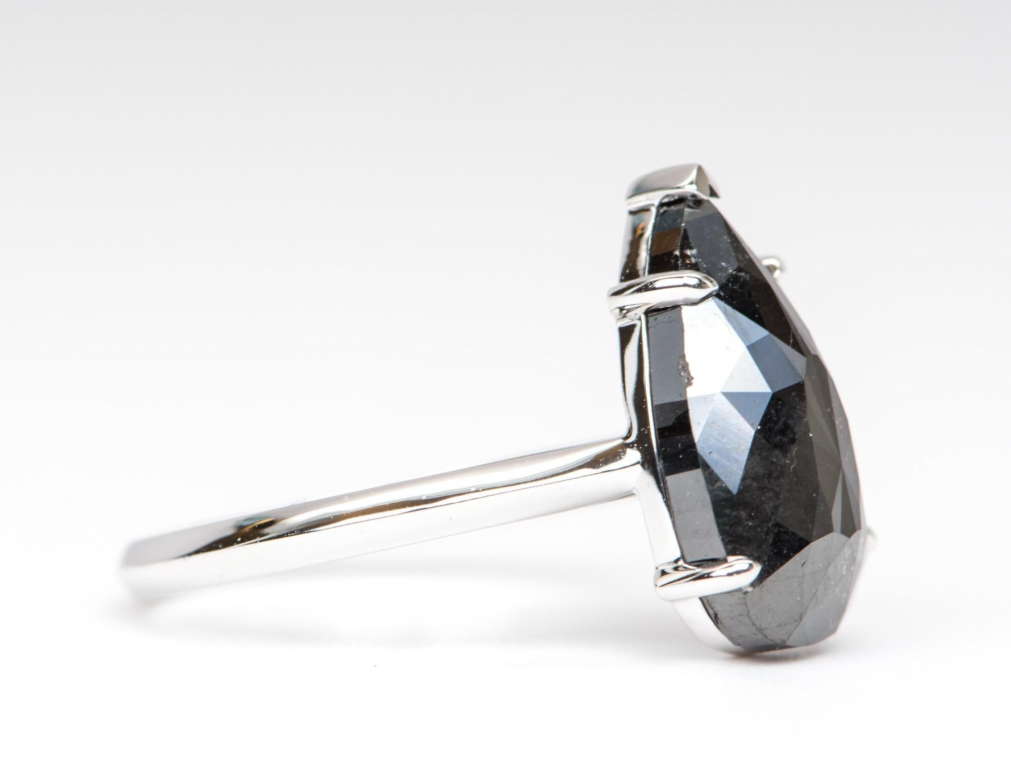 ♥ 5.37ct Elongated Black Diamond Engagement Ring 14K White Gold
♥ Solid 14k white gold ring set with a beautiful pear-shaped diamond
♥ Gorgeous black color!
♥ The item measures 16.5 mm in length, 10 mm in width, and stands 7.9 mm from the finger

♥