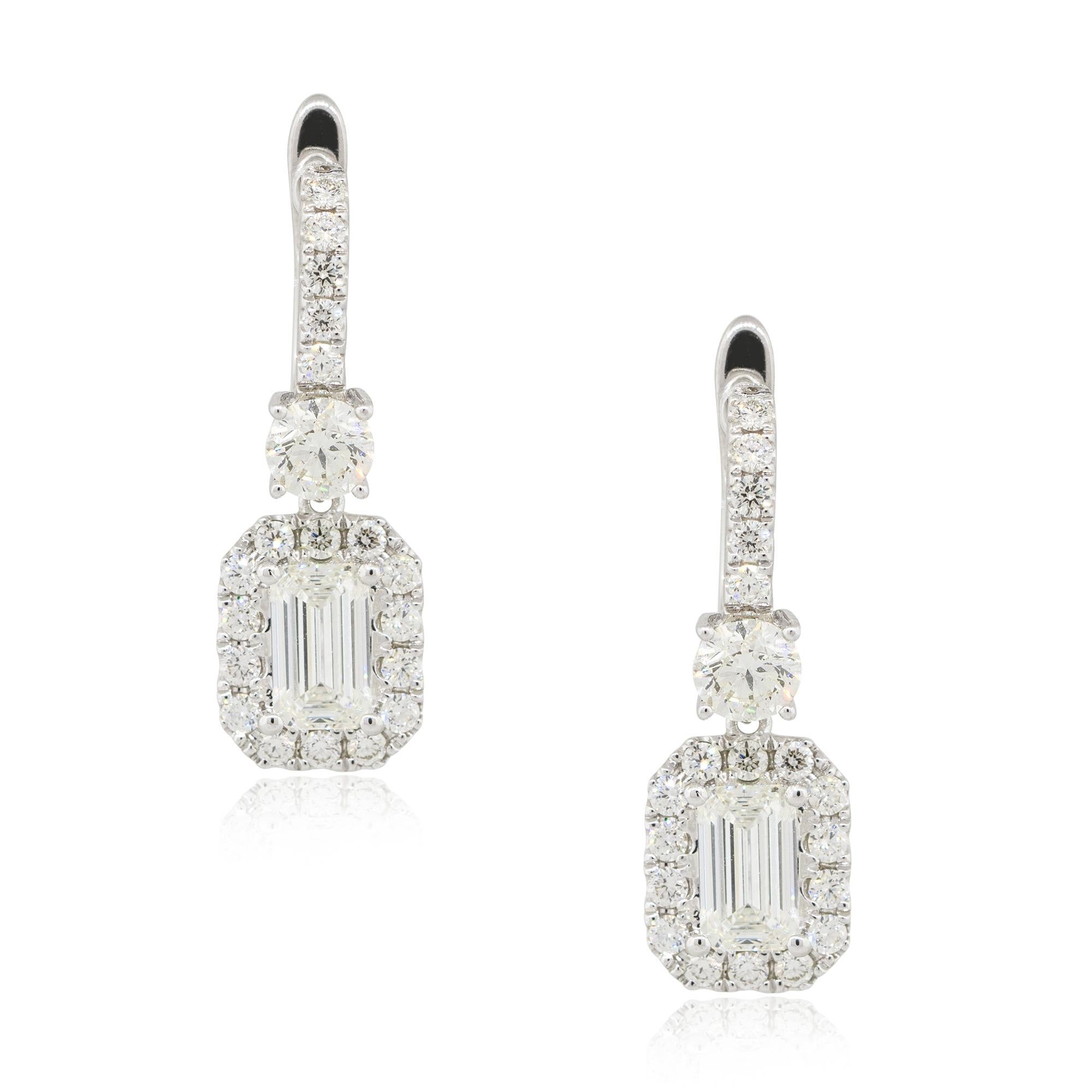 Material: 18k White Gold
Diamond Details: Approx. 1.40ctw of Emerald cut Diamonds. Diamonds are G/H in color and VS in clarity
                             Approx. 1.29ctw of round cut Diamonds. Diamonds are G/H in color and VS in clarity
          