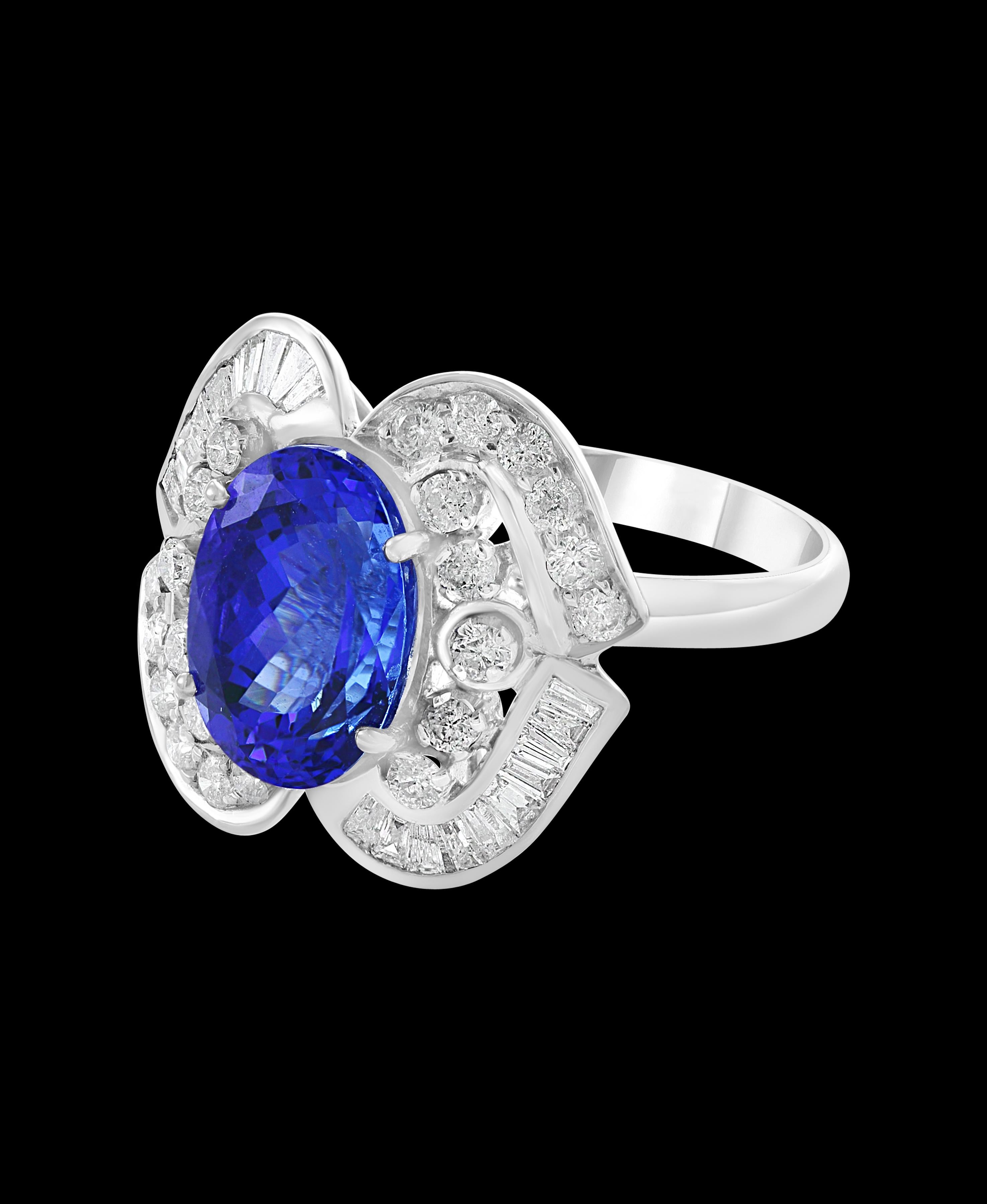 This extraordinary, 5.38 carat tanzanite is truly an extraordinary gemstone. There are  total  of 1.35 carats of shimmering white diamonds, this brilliant Oval-cut gem exhibits the rich violetish-blue color for which these stones are known and so