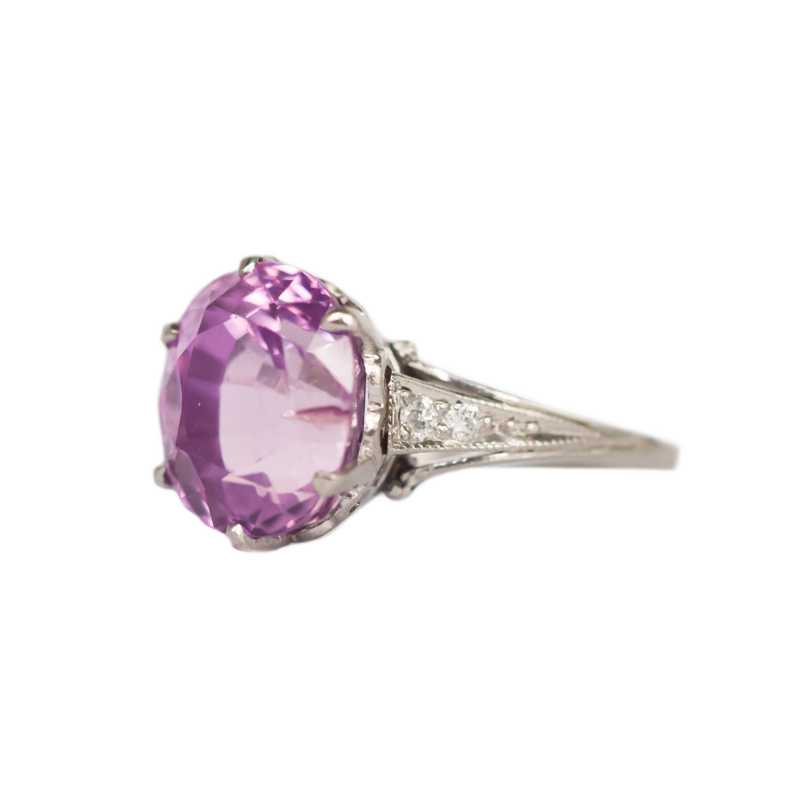 Ring Size: 4.90
Metal Type: Platinum
Weight: 4.1 grams

Color Stone Details: 
Type: Natural Unheated Sapphire 
Shape: Antique Oval
Carat: 5.38 carat
Color: Pink


Side Stone Details: 
Shape: Old European Brilliant 
Total Carat Weight: .08 carat,