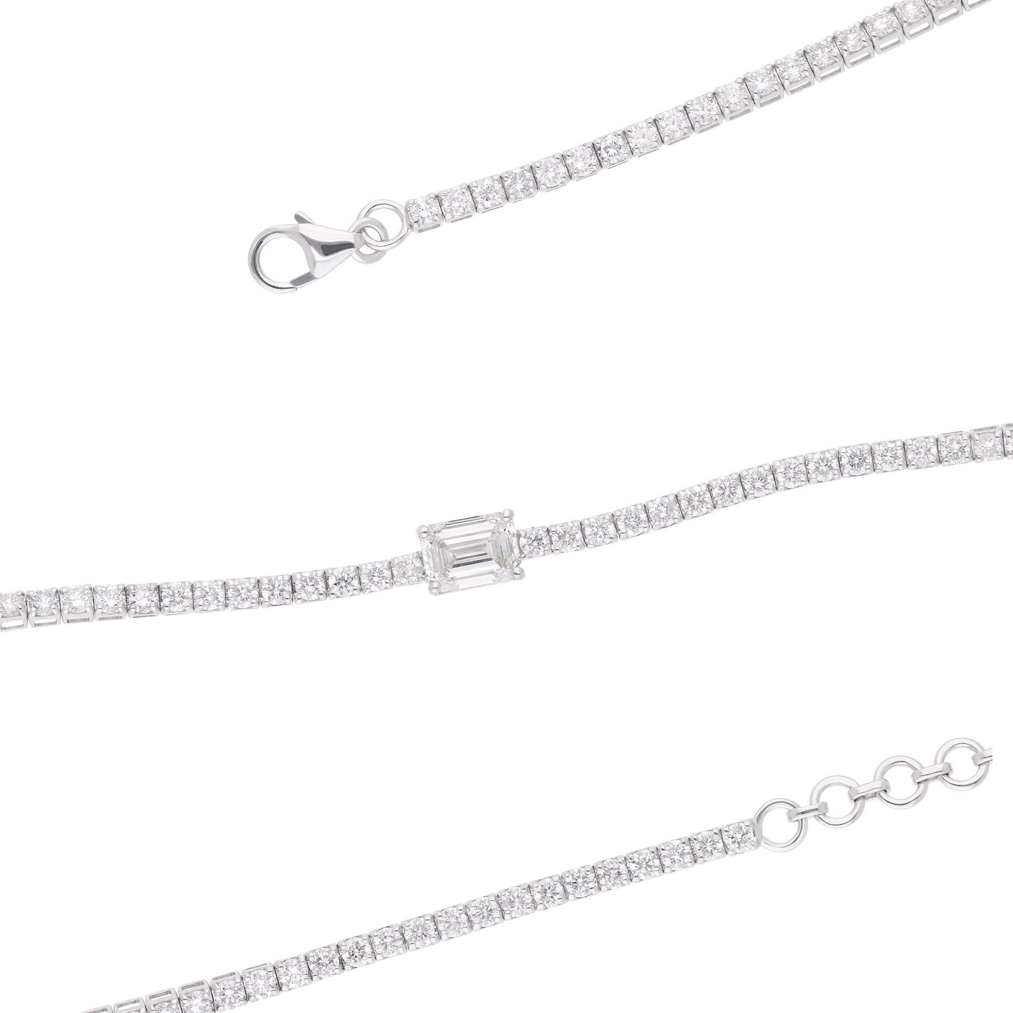 Crafted from 18 karat solid white gold, this necklace exudes a luxurious allure, its gleaming metal providing the perfect backdrop for the captivating emerald-cut diamonds that adorn it. Each diamond is carefully selected for its exceptional