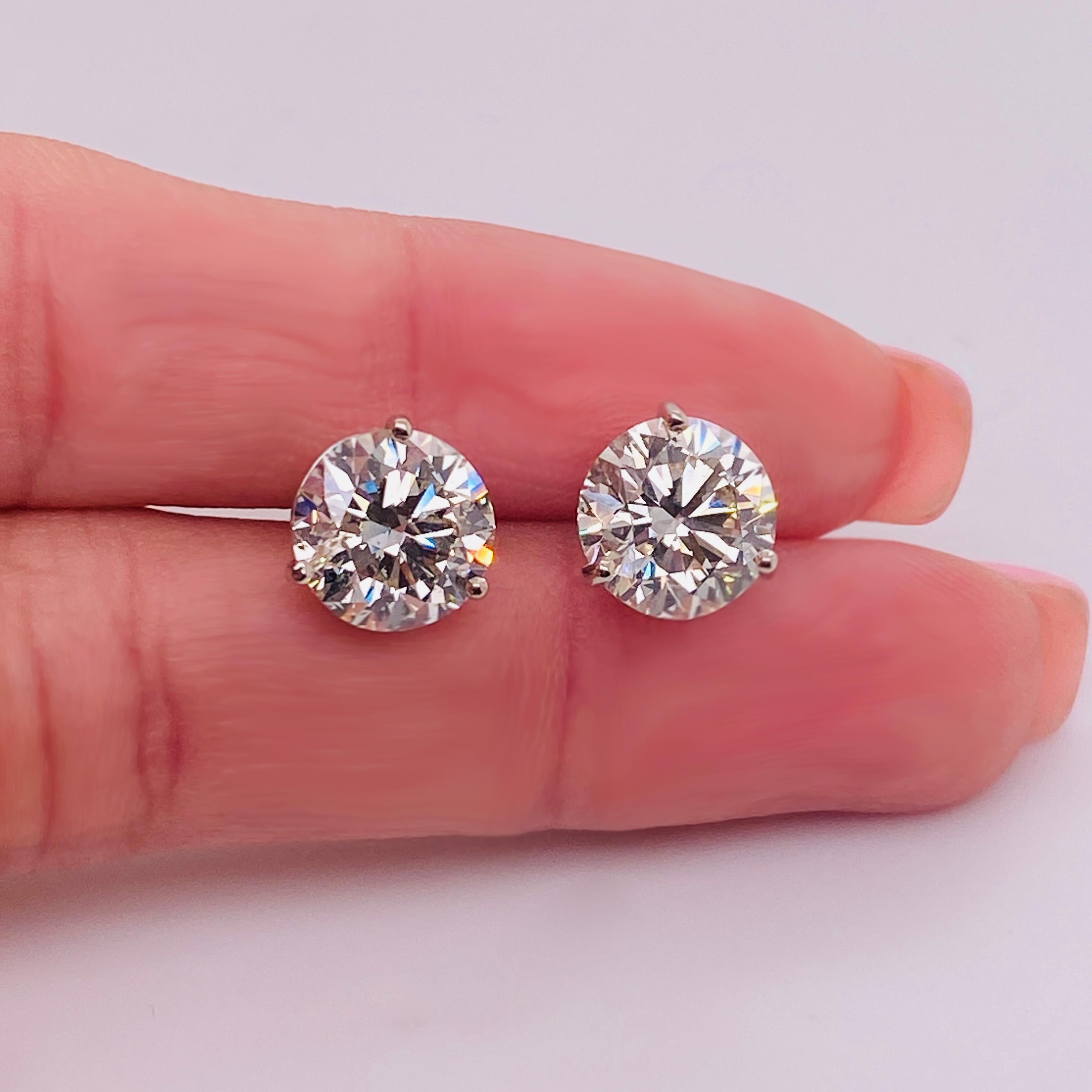 These stunning martini stud diamond earrings are perfect for any ear! The total weight of these diamonds is 5.38 carats with SI clarity and G-H color. Will you be the one to rock these gems? Martini studs are popular because they have a low profile