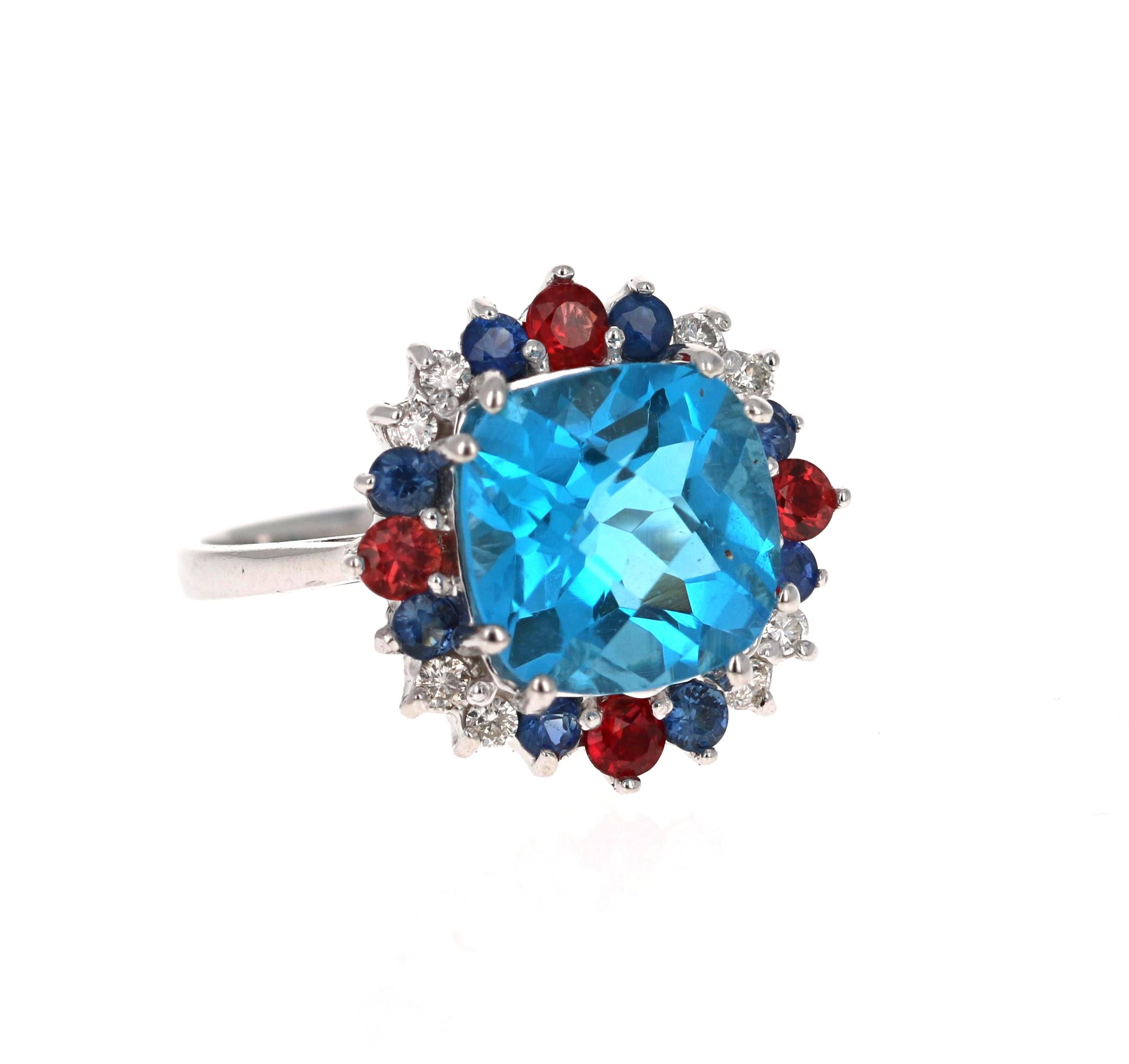 5.39 Carat Cushion Cut Blue Topaz Sapphire Diamond 14K Yellow Gold Cocktail Ring

This beautiful Cushion Cut Blue Topaz, Sapphire and Diamond Ring has a stunning 4.56 Carat Blue Topaz and its surrounded by 12 Red and Blue Sapphires that weigh 0.83