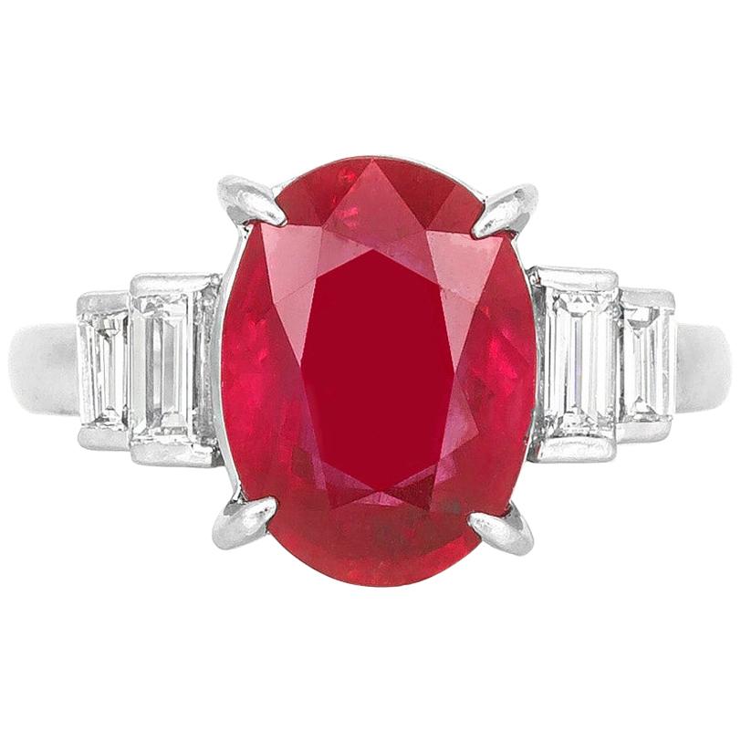 5.39 Carat Burmese Oval Cut Ruby Ring with Diamonds For Sale