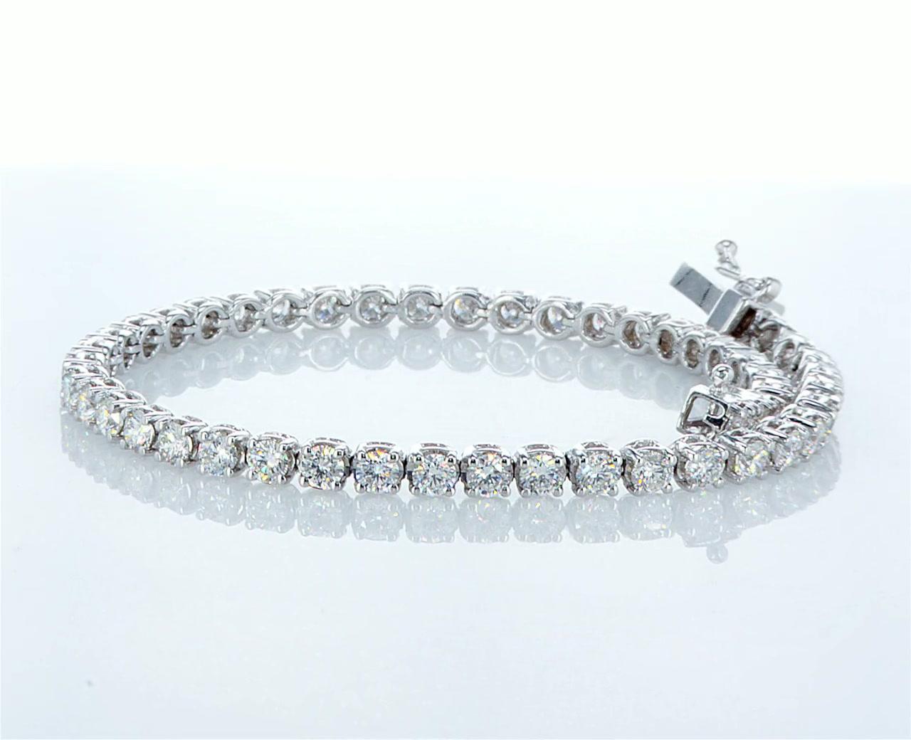 Our classic handcrafted Diamond Tennis Bracelet showcasing 50 stunning Round Brilliant cut diamonds 5.39 Carat total weight, D color and VS Clarity. 
The timeless tennis bracelet is made with precise craftsmanship and set on 14K white gold. 
The