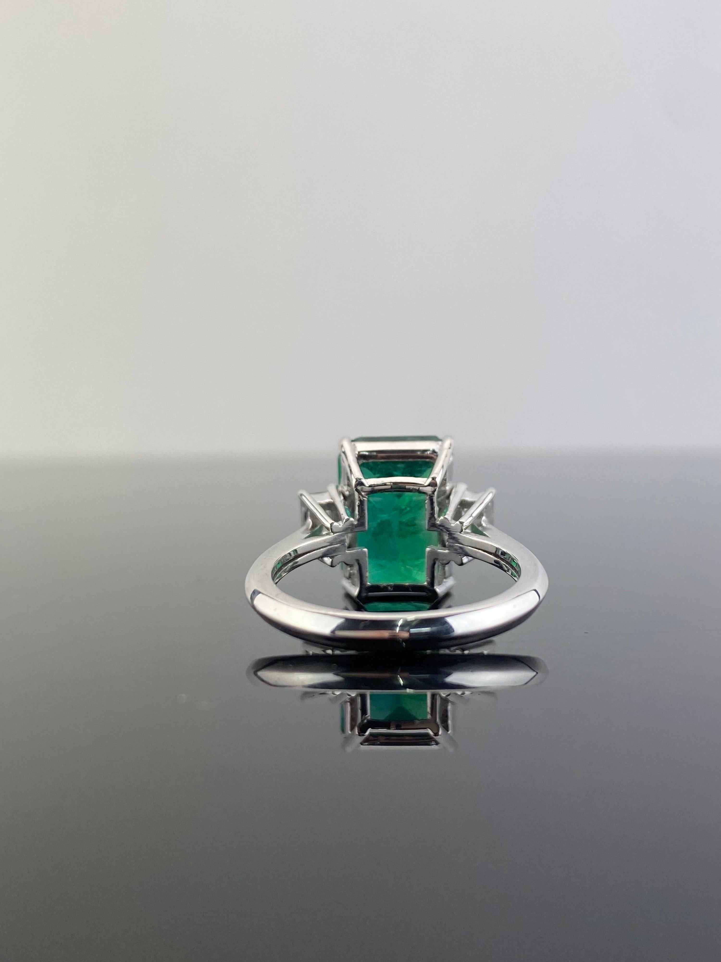 Emerald Cut 5.39 Carat Emerald and Diamond Three-Stone Engagement Ring