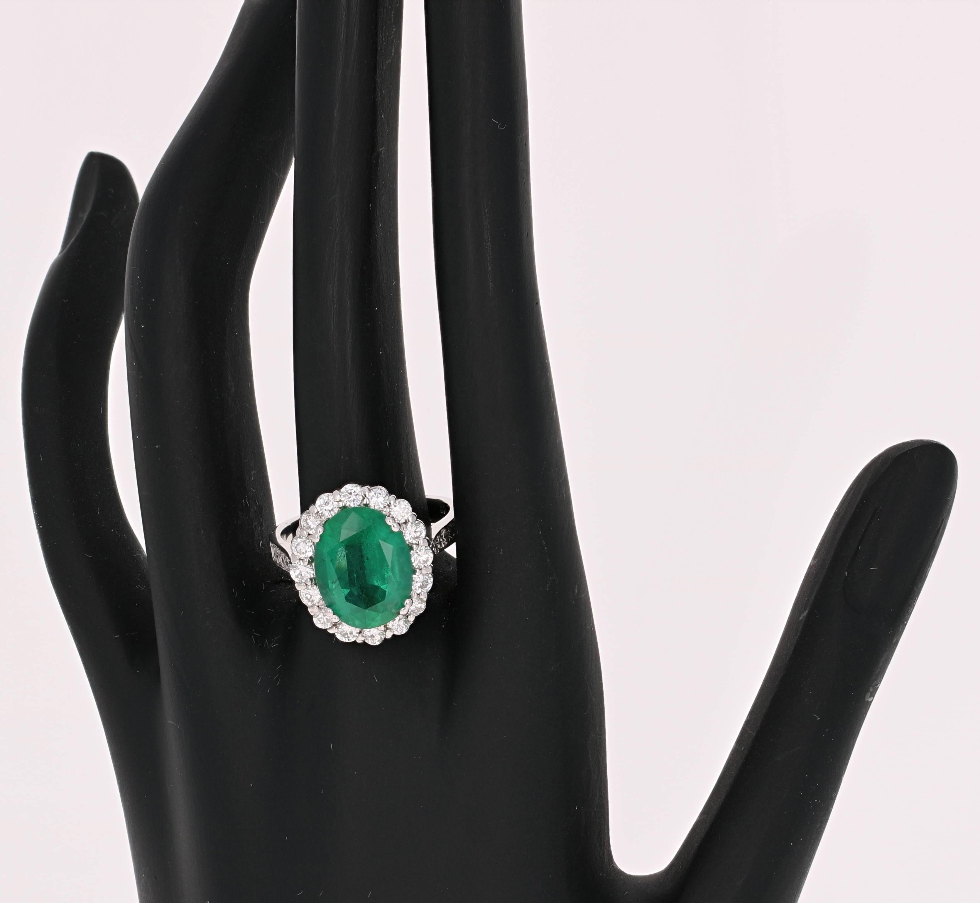 Oval Cut 5.39 Carat Emerald Diamond White Gold Cocktail Ring