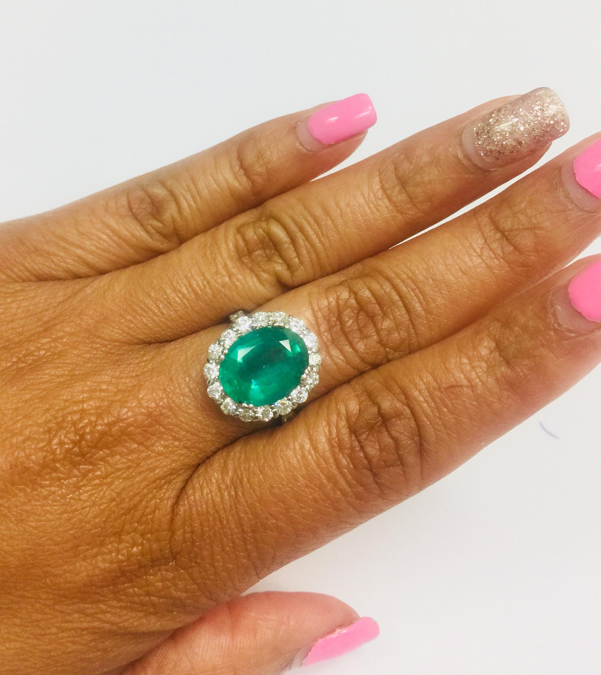 Oval Cut 5.39 Carat Emerald Diamond White Gold Engagement Ring