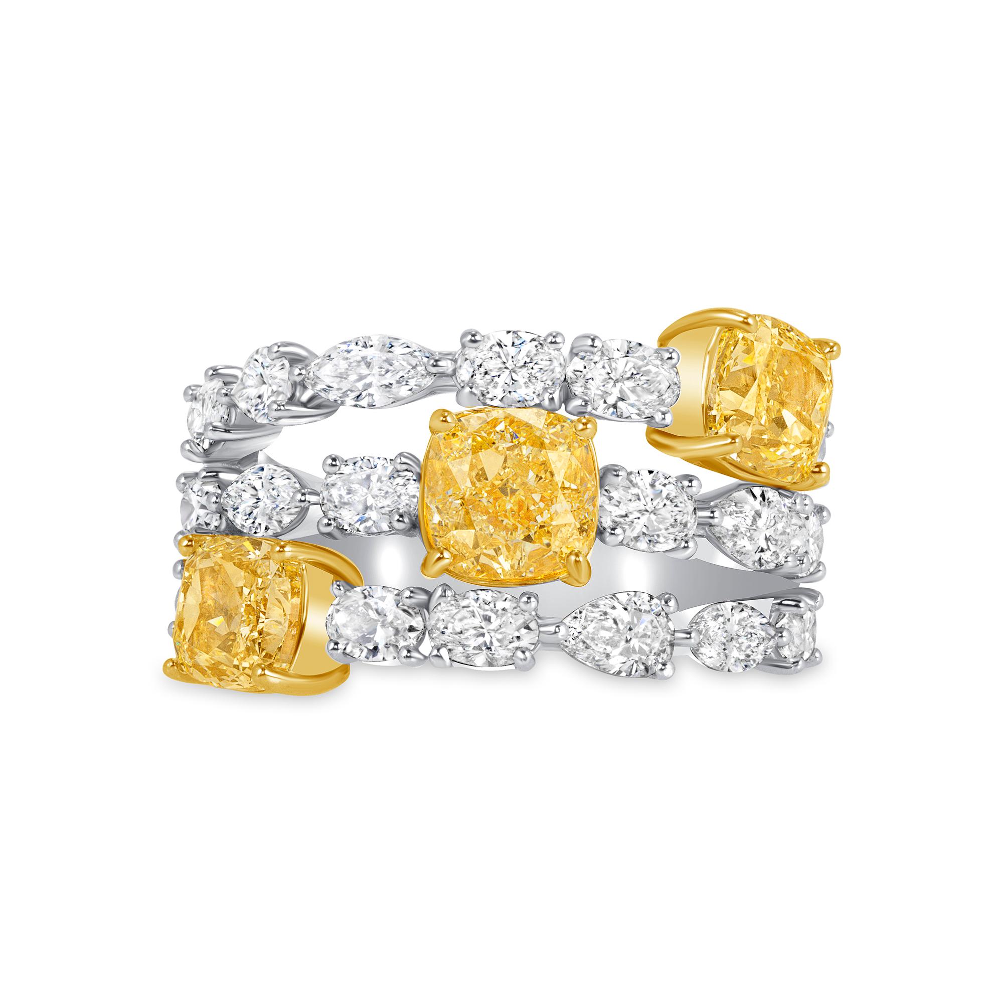 Light Yellow Diamonds and Fancy shape Diamonds Three Row Ring in 18K Yellow Gold and Platinum. This ring has three Light Fancy Yellow Cushion diamonds weighed 3.19 carat and eighteen Fancy shape diamonds weighed 2.20 carats, in a total of 5.39