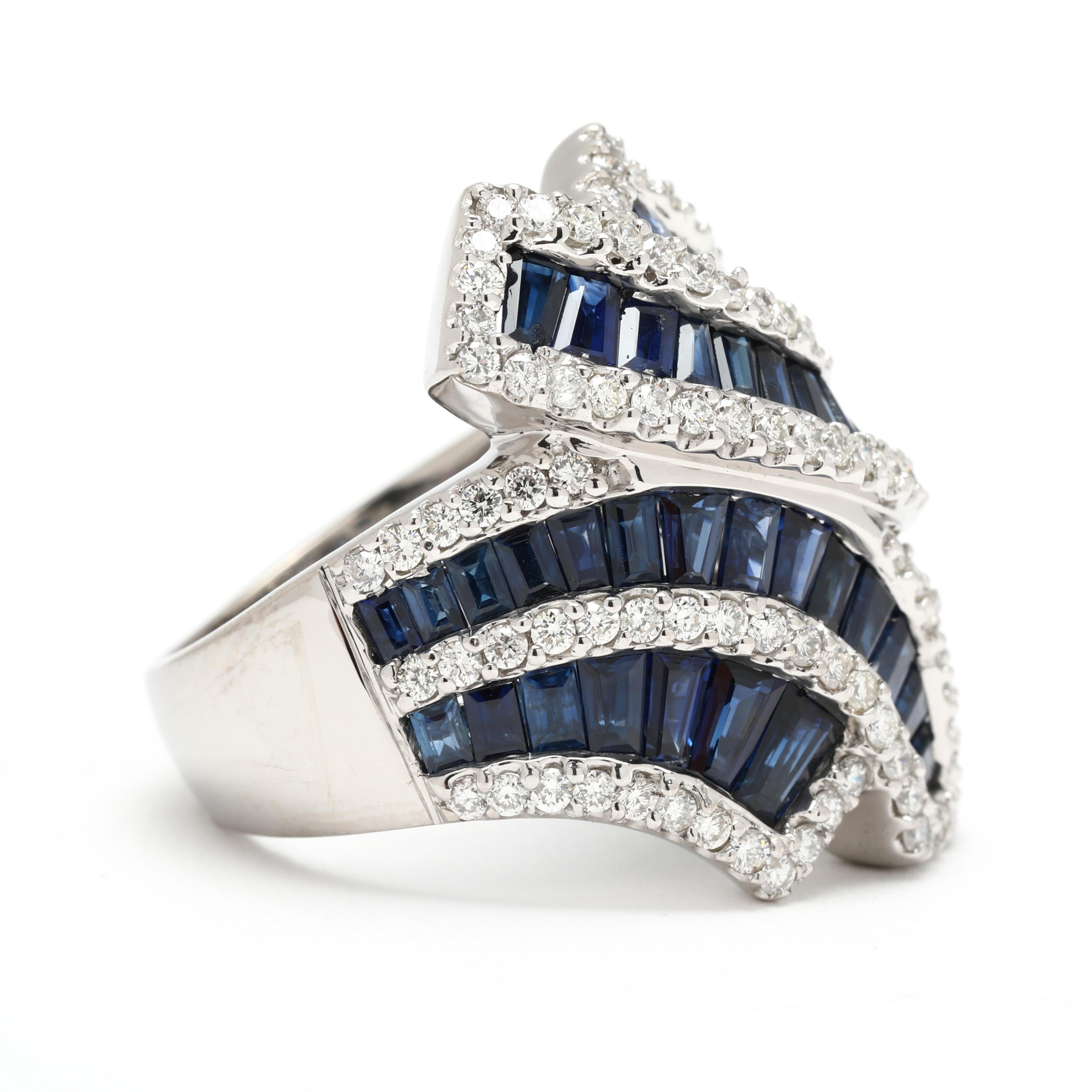 Steine:
Diamant, 109
runder Brillantschliff
1.4 - 1.5 mm
etwa 1,16 Karat insgesamt
FG Farbe/ VS1-2 Klarheit
Saphir
spitz zulaufendes Baguette
etwa 4.14 Karat insgesamt

Ring Größe 6.75

Erhebung vom Finger: 7.1 mm

Länge: 1 Zoll.

Gewicht: 7,4 dwts/