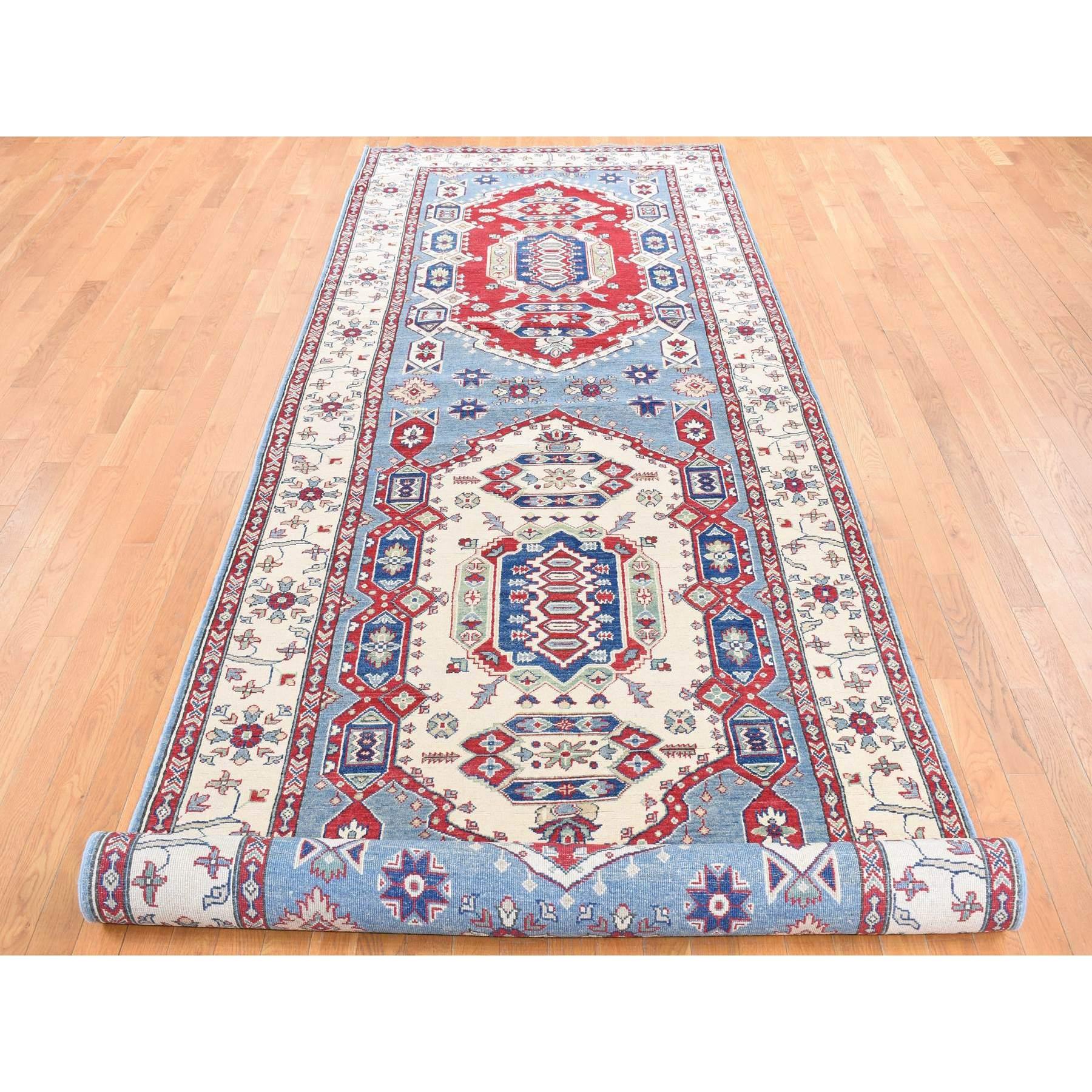 Baby Blue, Hand Knotted, 100% Wool, Kazak Tribal Design, Extra Wide and Long Runner, Oriental Rug
Primary materials: Wool
Latex: No Pile 
height: 0.25 Inches
Style: Traditional
Primary color: Blue
Secondary colors: Red, Green, Little Boy Blue, Cream